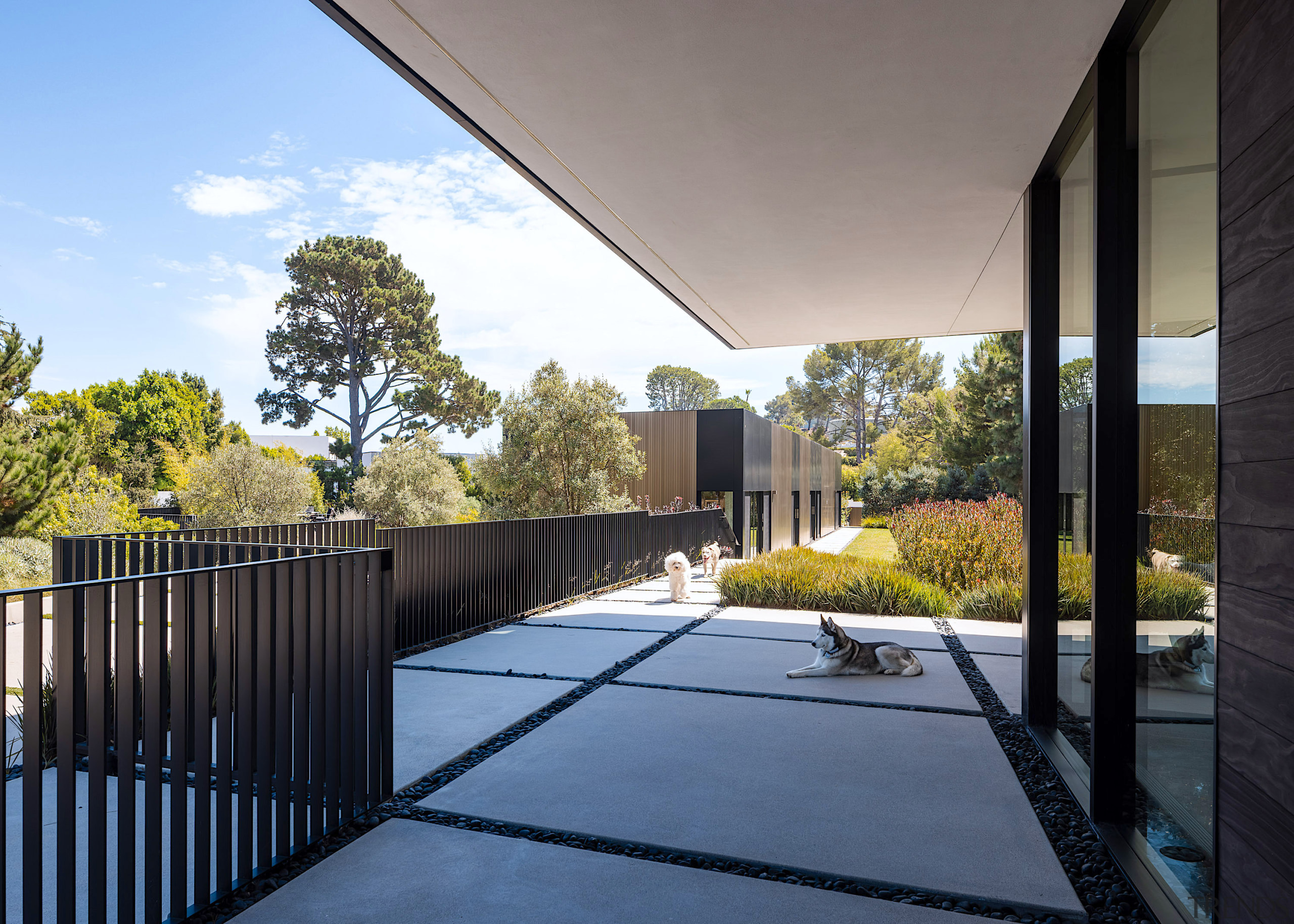 The cantilevered upper level naturally provides shade and 