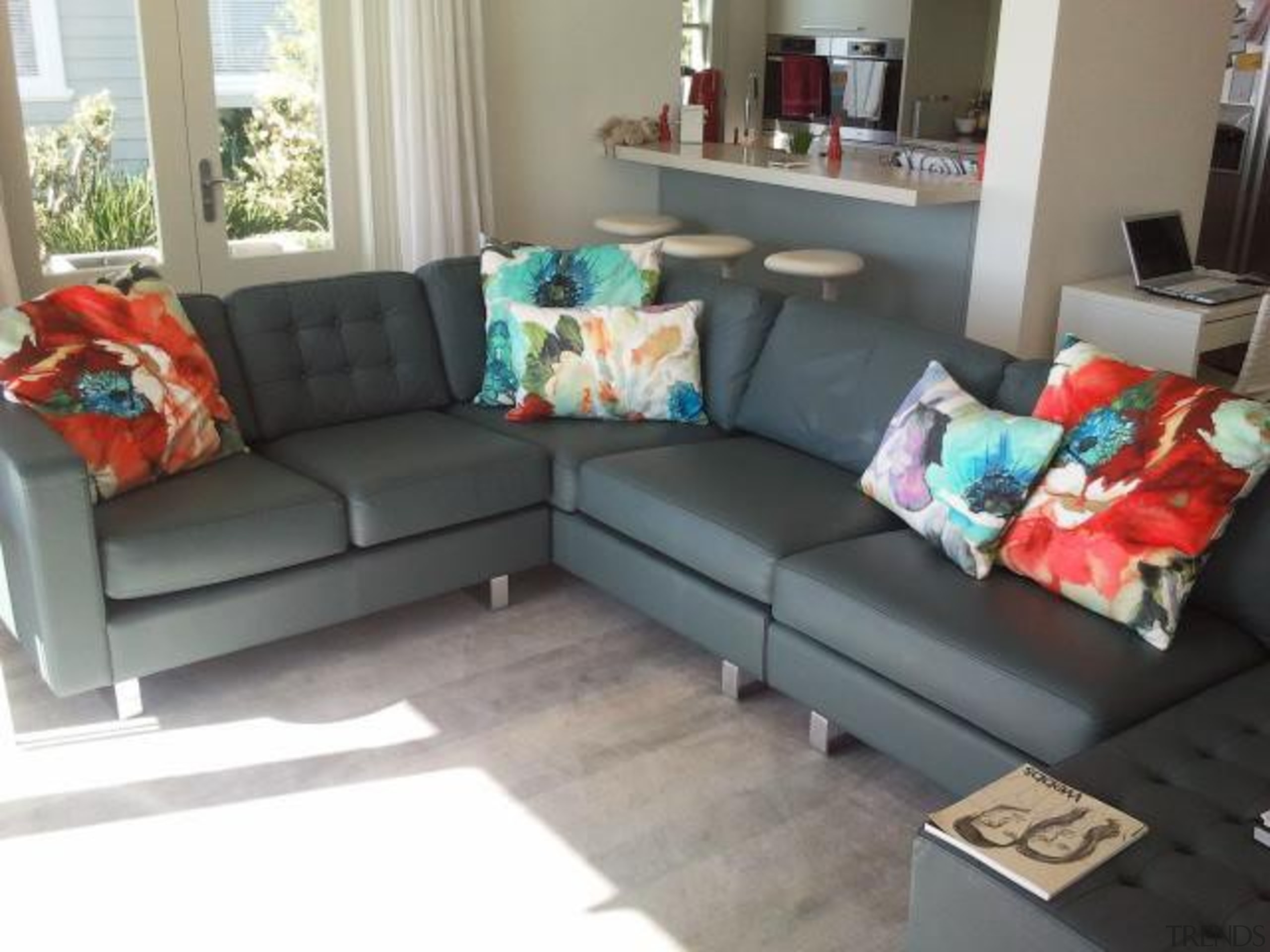 419.jpg - angle | chair | couch | angle, chair, couch, floor, flooring, furniture, home, interior design, living room, loveseat, property, room, sofa bed, table, gray, white