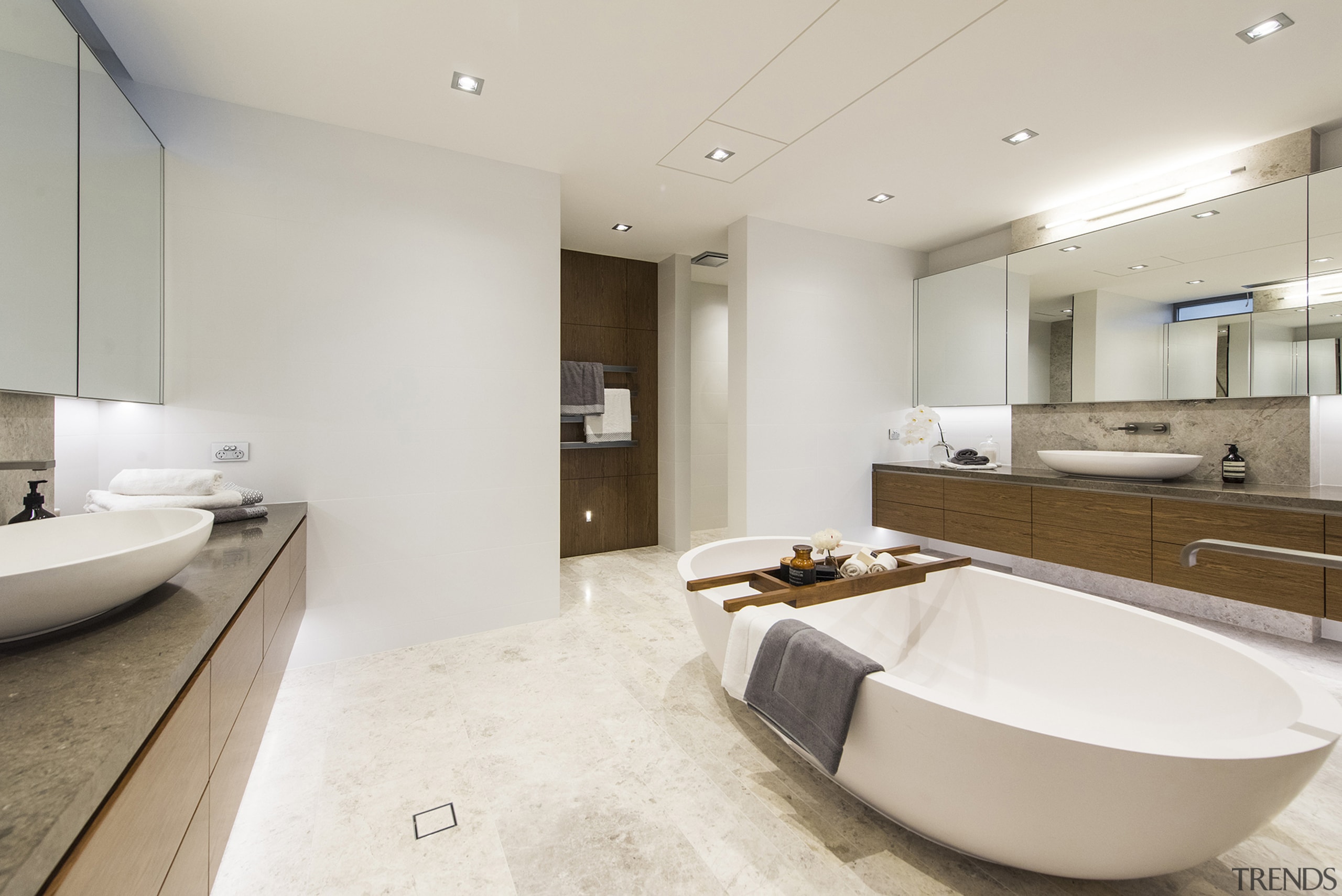 In this master ensuite, oval countertop basins on bathroom, floor, interior design, real estate, room, sink, gray