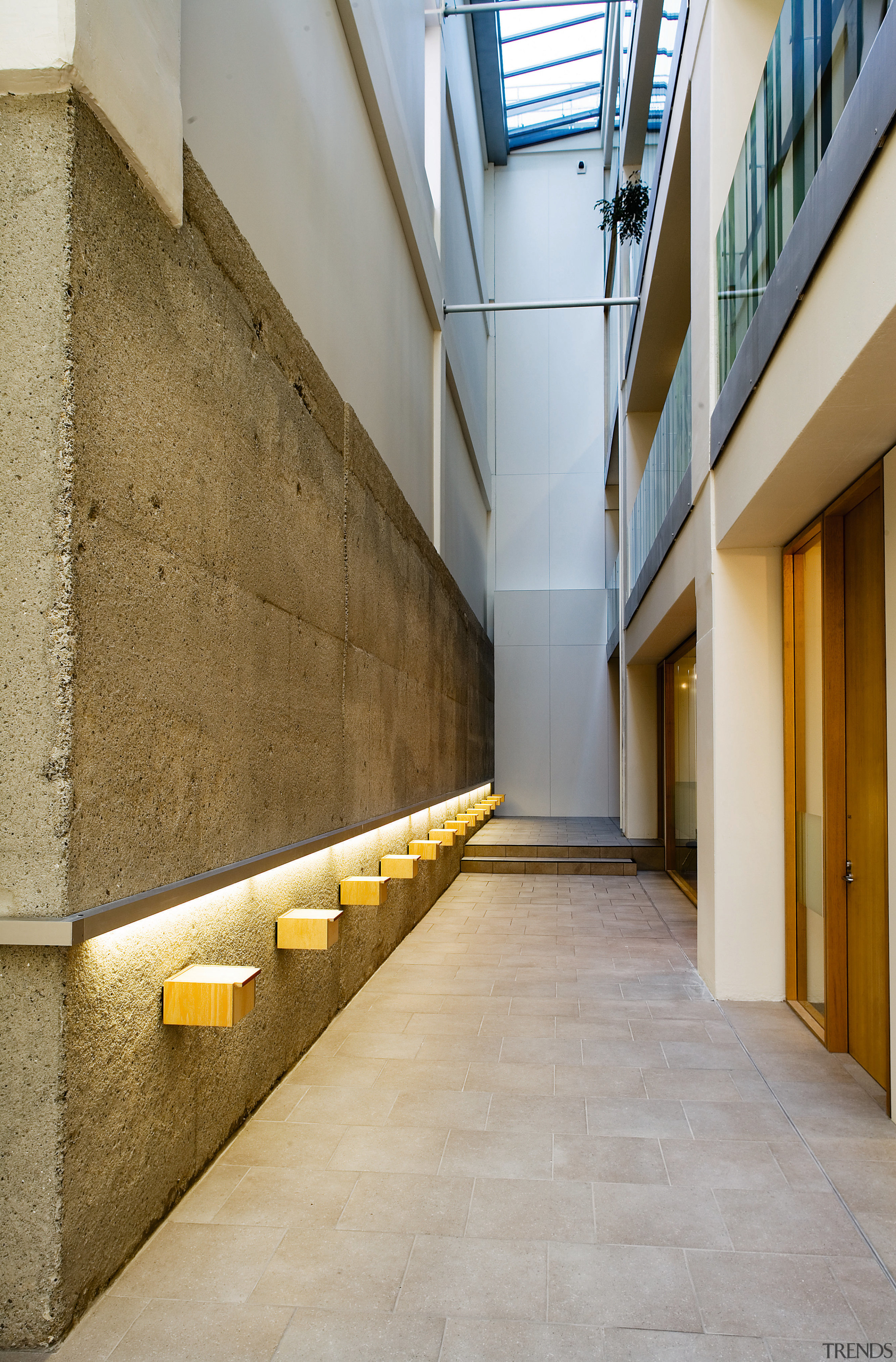 A view of the new Miconic 10 Schindler apartment, architecture, building, daylighting, facade, floor, handrail, house, interior design, stairs, wall, window, gray, brown