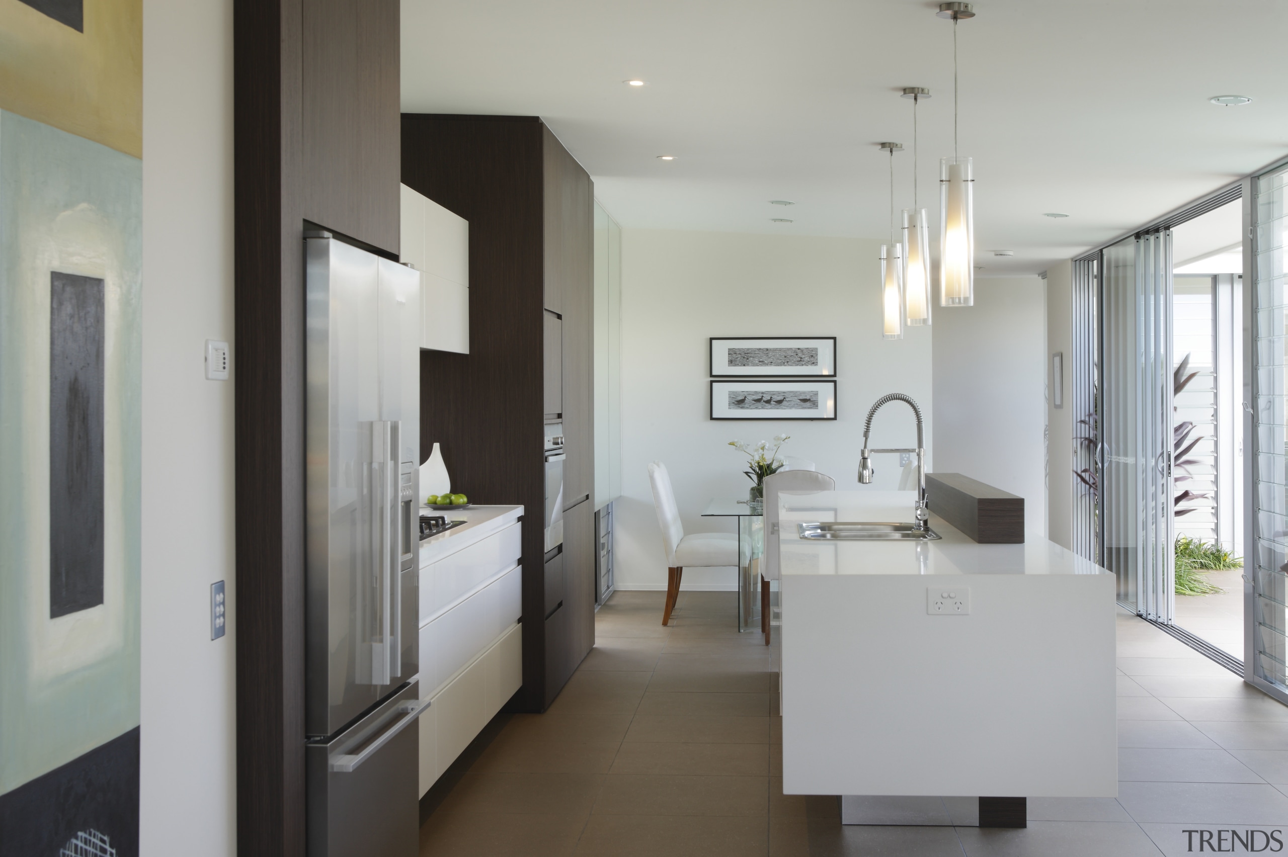 white room is offset by dark brown cabinetry ceiling, floor, house, interior design, product design, real estate, room, gray