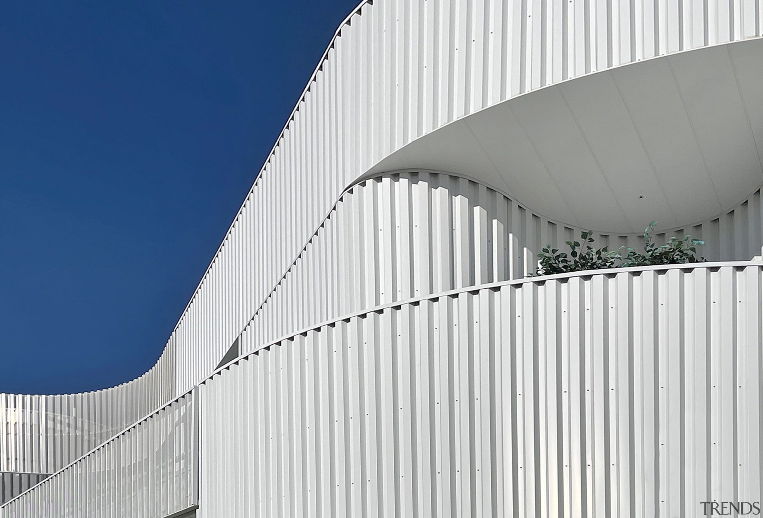 The curvy aluminium facade also appears as a 