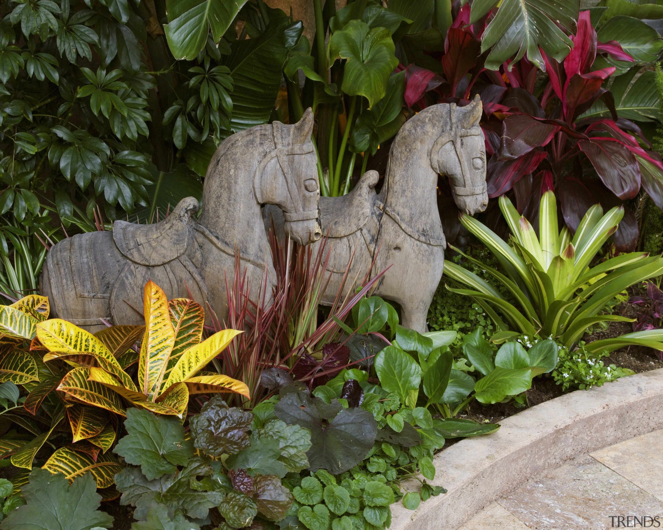 View of two equine sculptures from Bali standing garden, leaf, plant, yard, brown