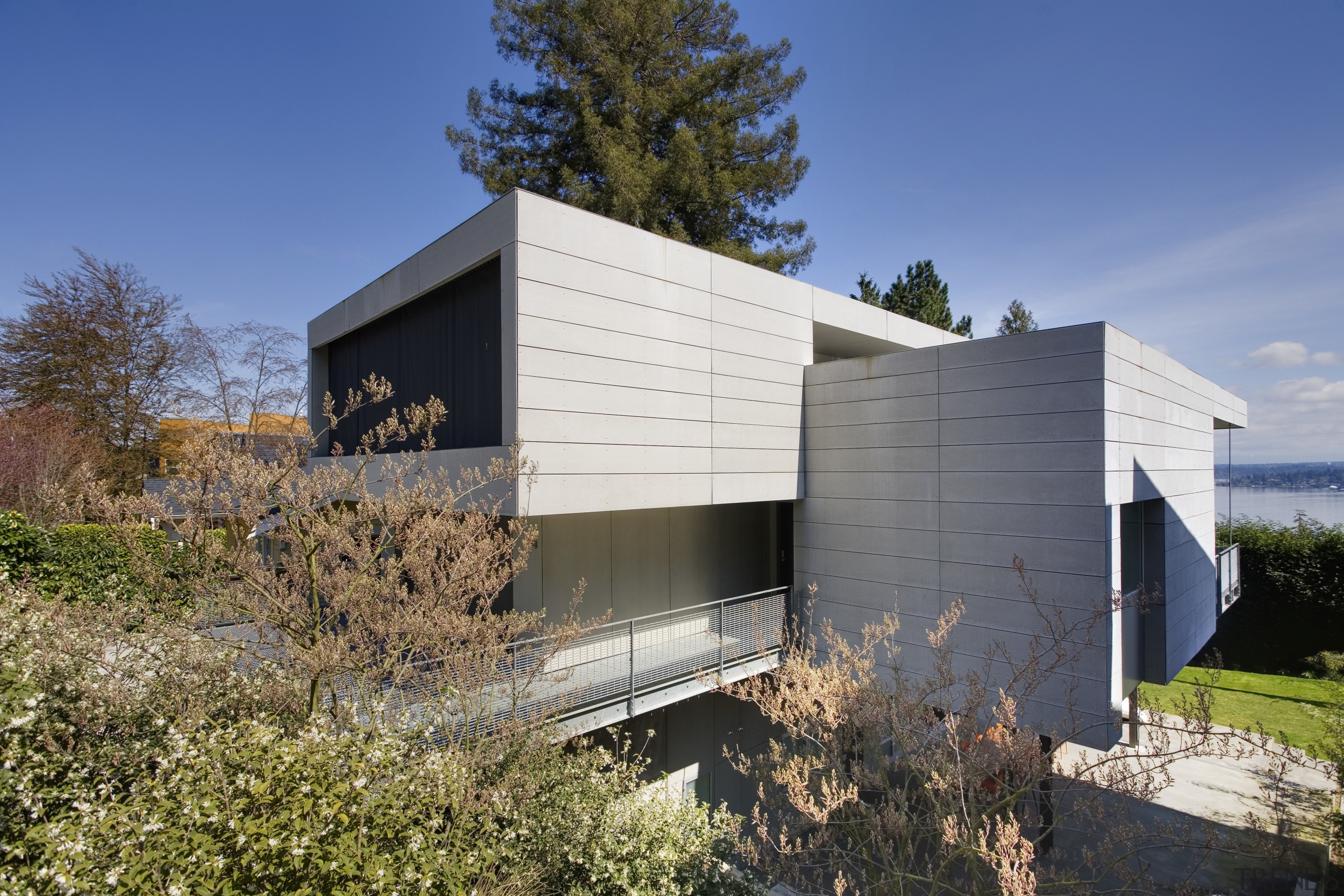 View of sculptural home. - View of sculptural architecture, cottage, facade, home, house, real estate, shed, siding, blue