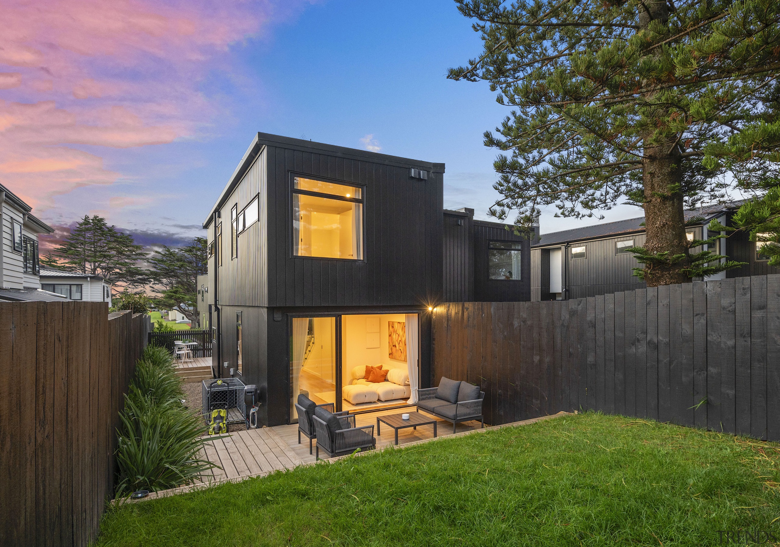 The private al fresco setting and rear lawn. 