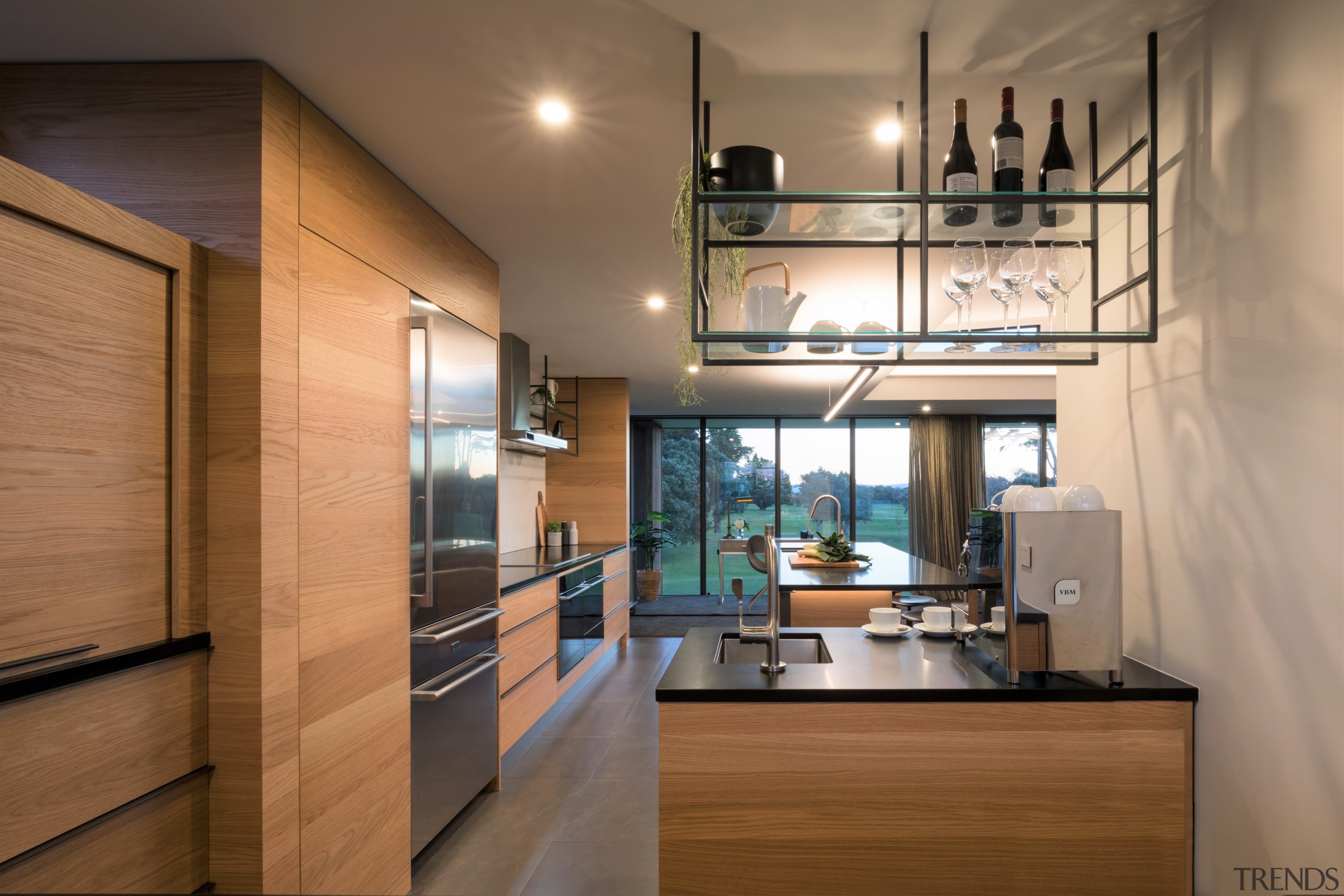 ​​​​​​​Extensive storage in this kitchen comes via a brown