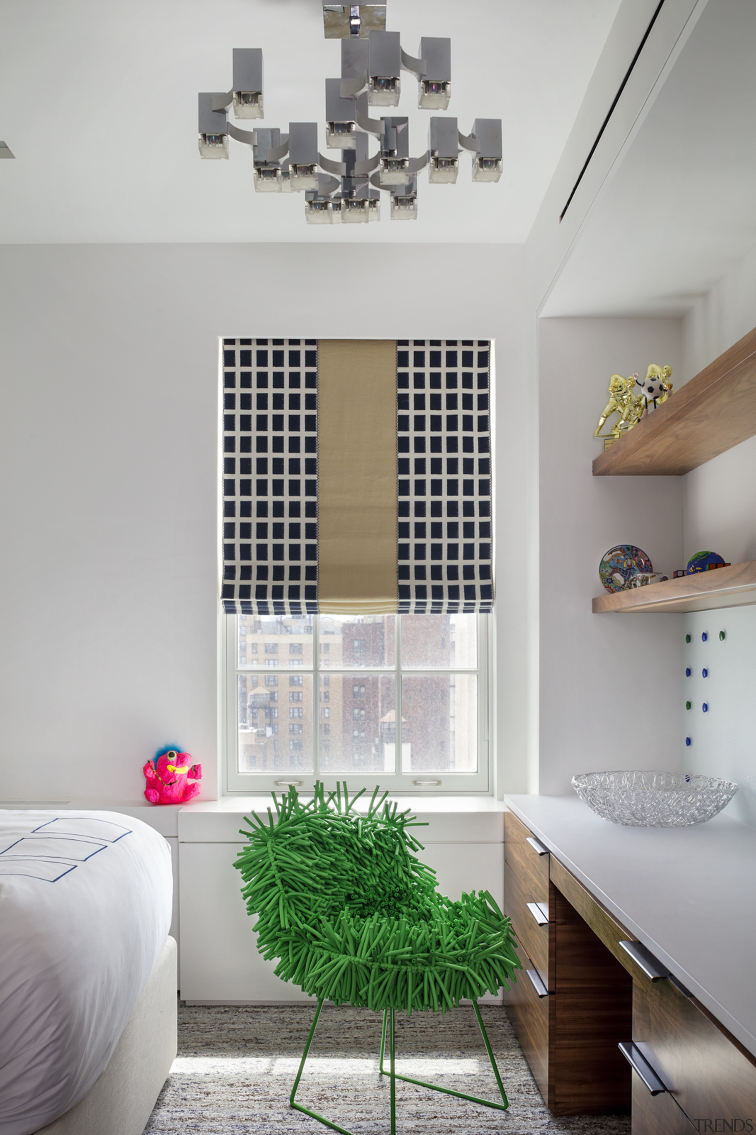 Both children's bedrooms feature large desks of acrylic 