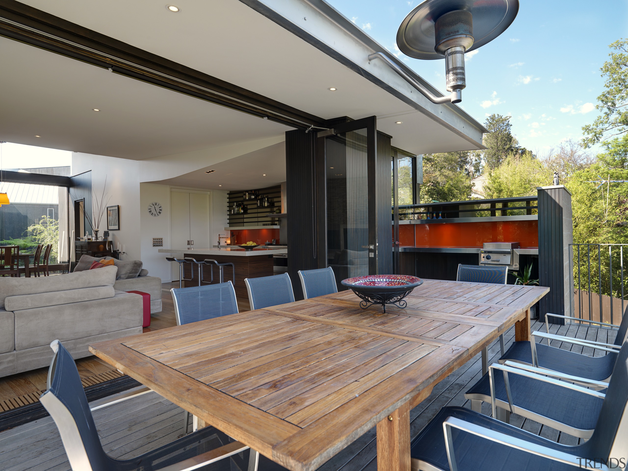 View of the outdoor entertaining area which features house, interior design, patio, real estate, gray