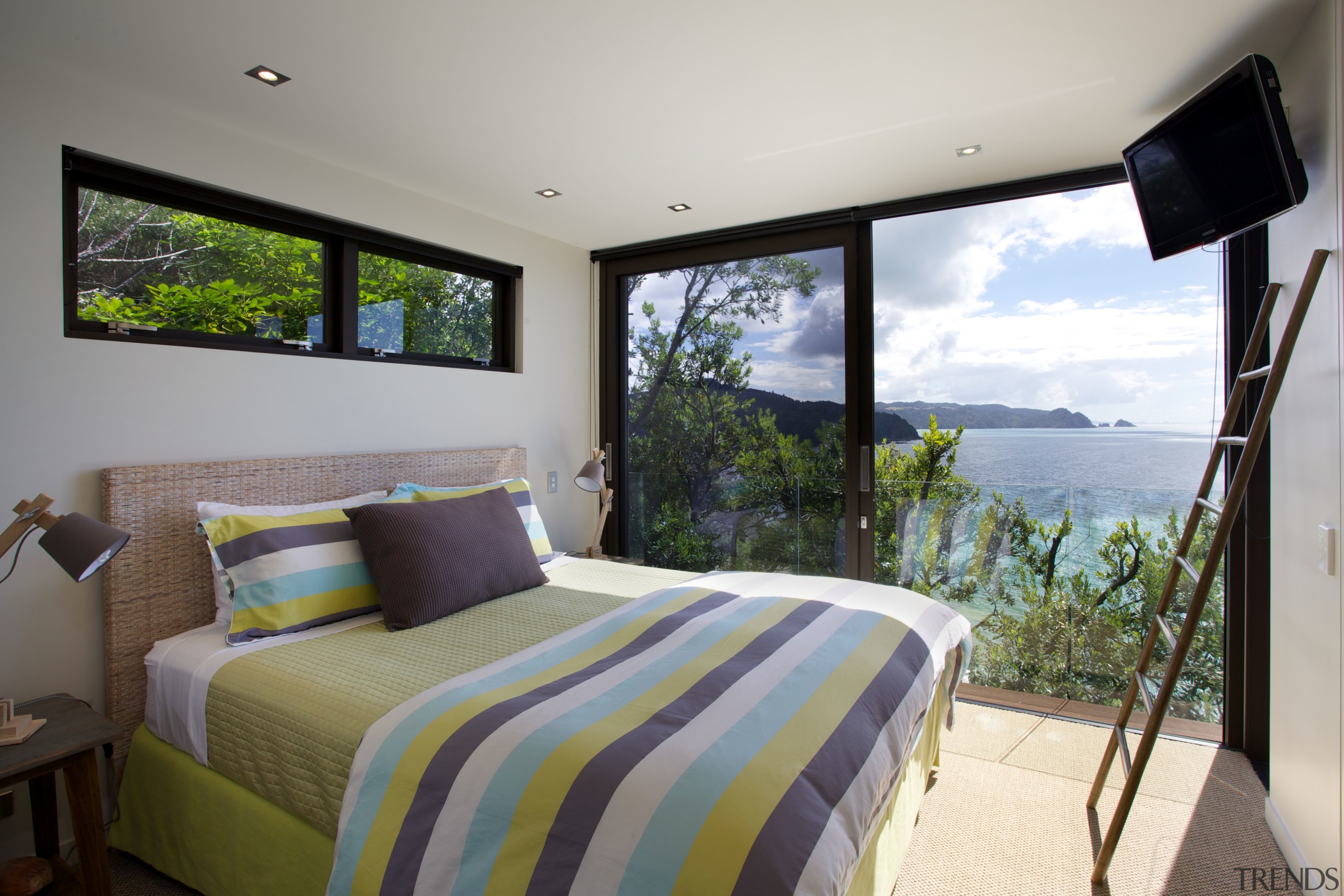 Black joinery frames the view from this bedroom, bedroom, estate, home, house, interior design, property, real estate, room, window, gray