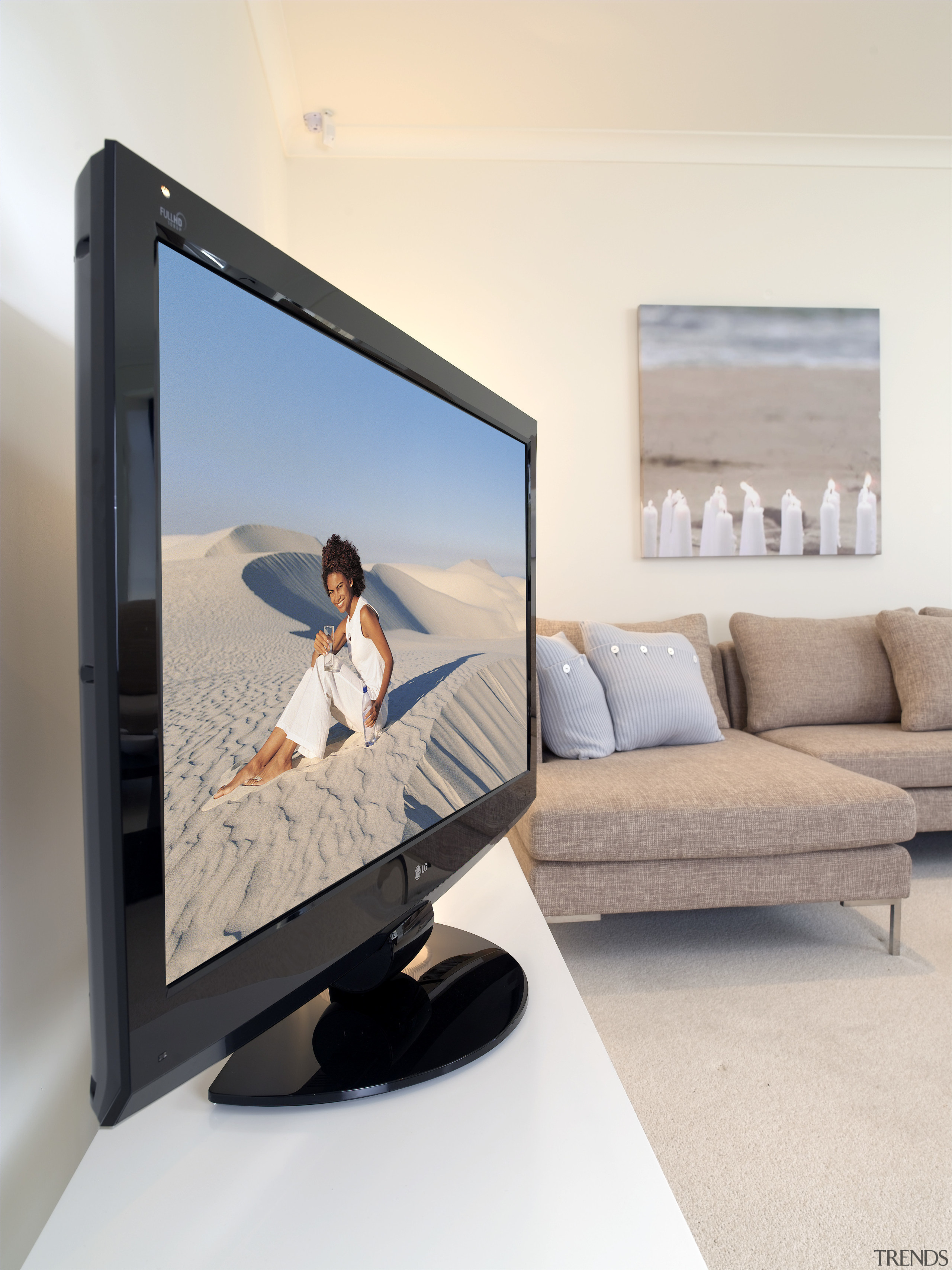 The latest LCD television from LG Electronics is computer monitor, display device, electronic device, furniture, media, multimedia, product design, screen, table, technology, television, white