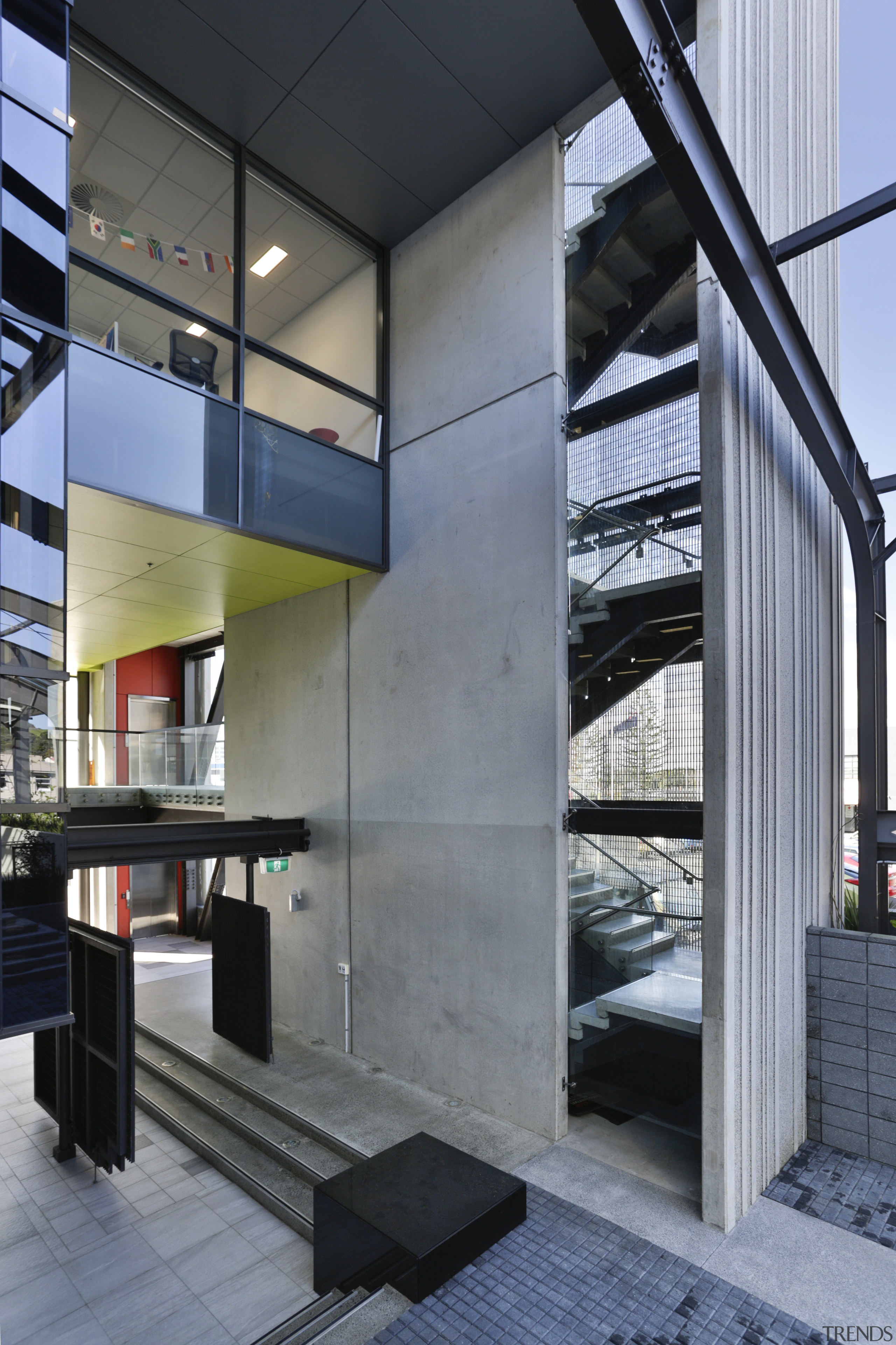 The externalised stairs and lift column delineate the architecture, building, facade, glass, house, interior design, gray, black