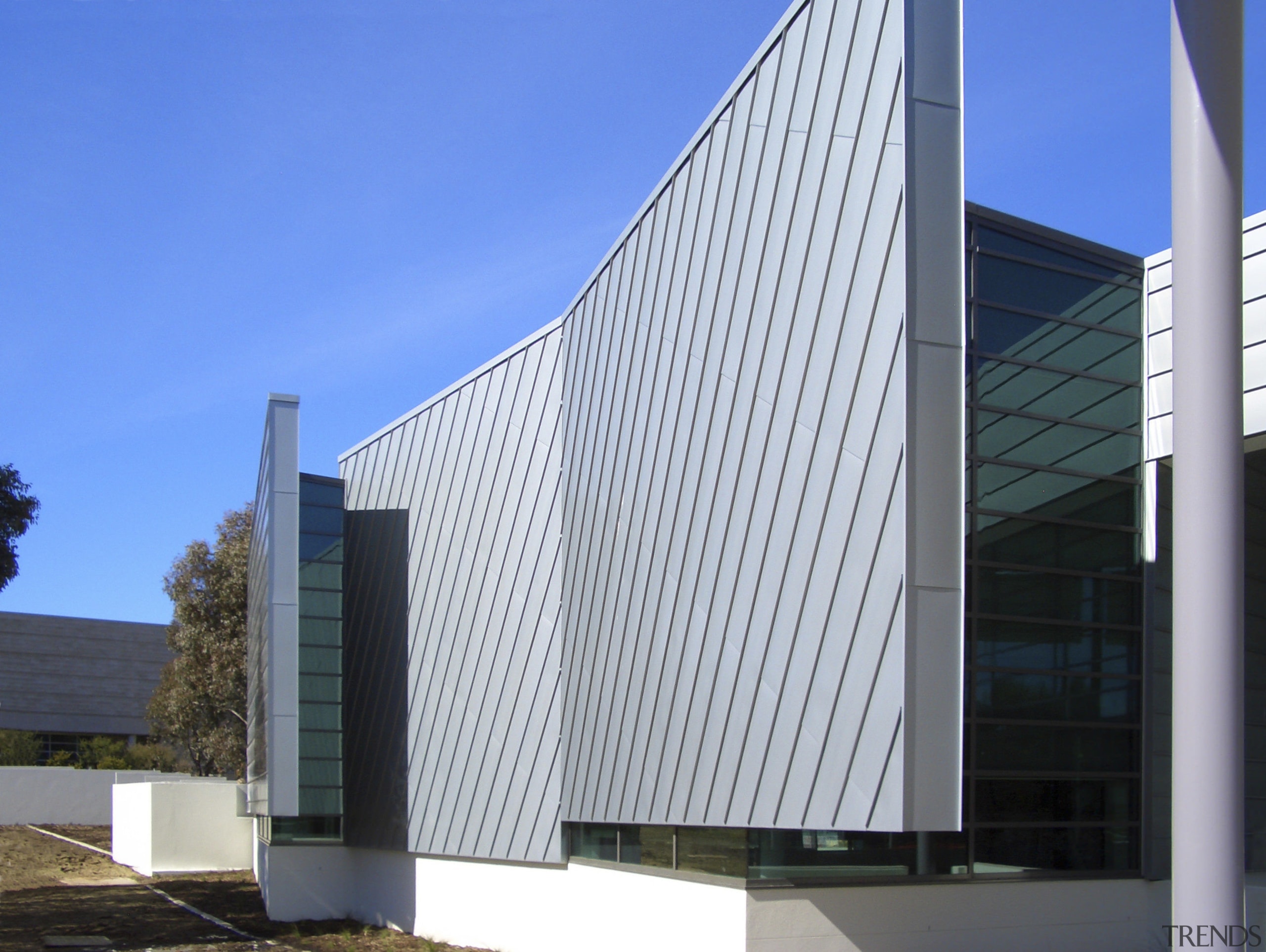 Exterior view of the National Centre for Social architecture, building, commercial building, corporate headquarters, daylighting, daytime, facade, headquarters, house, roof, sky, structure, window, gray, blue