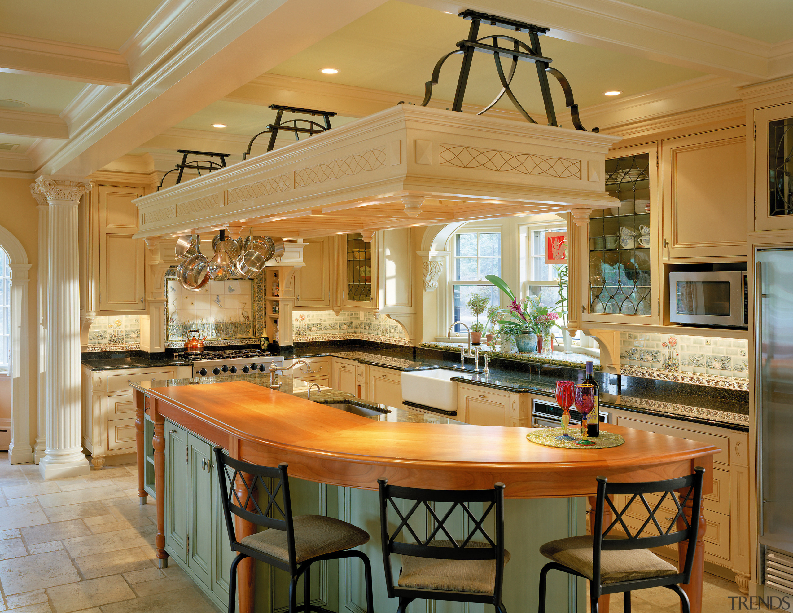 view of the kitchen featuring tiled flooring, timber cabinetry, ceiling, countertop, cuisine classique, estate, interior design, kitchen, real estate, room, orange, brown