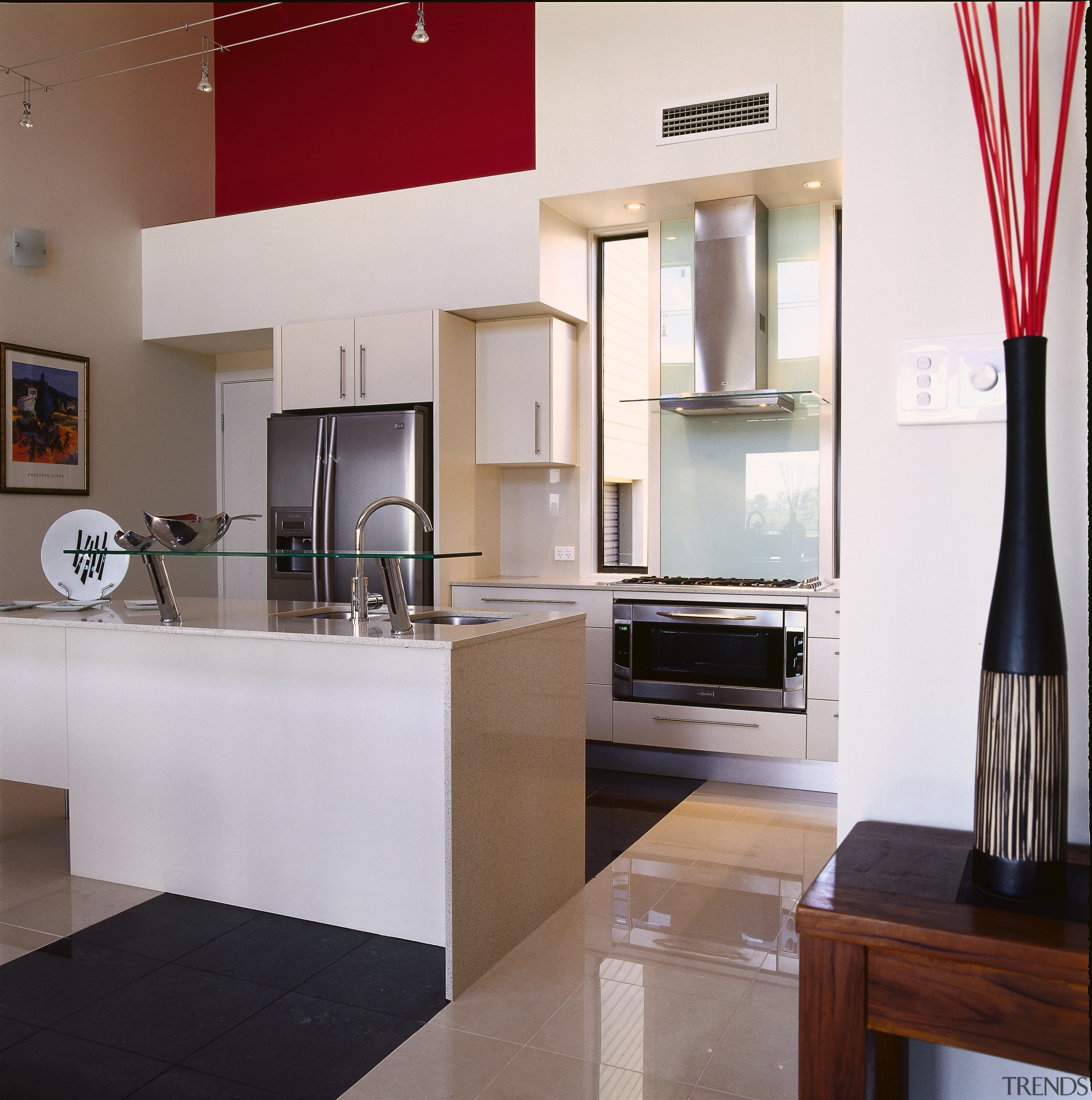 view of the kitchen area showing the stainless countertop, interior design, kitchen, real estate, room, white, gray