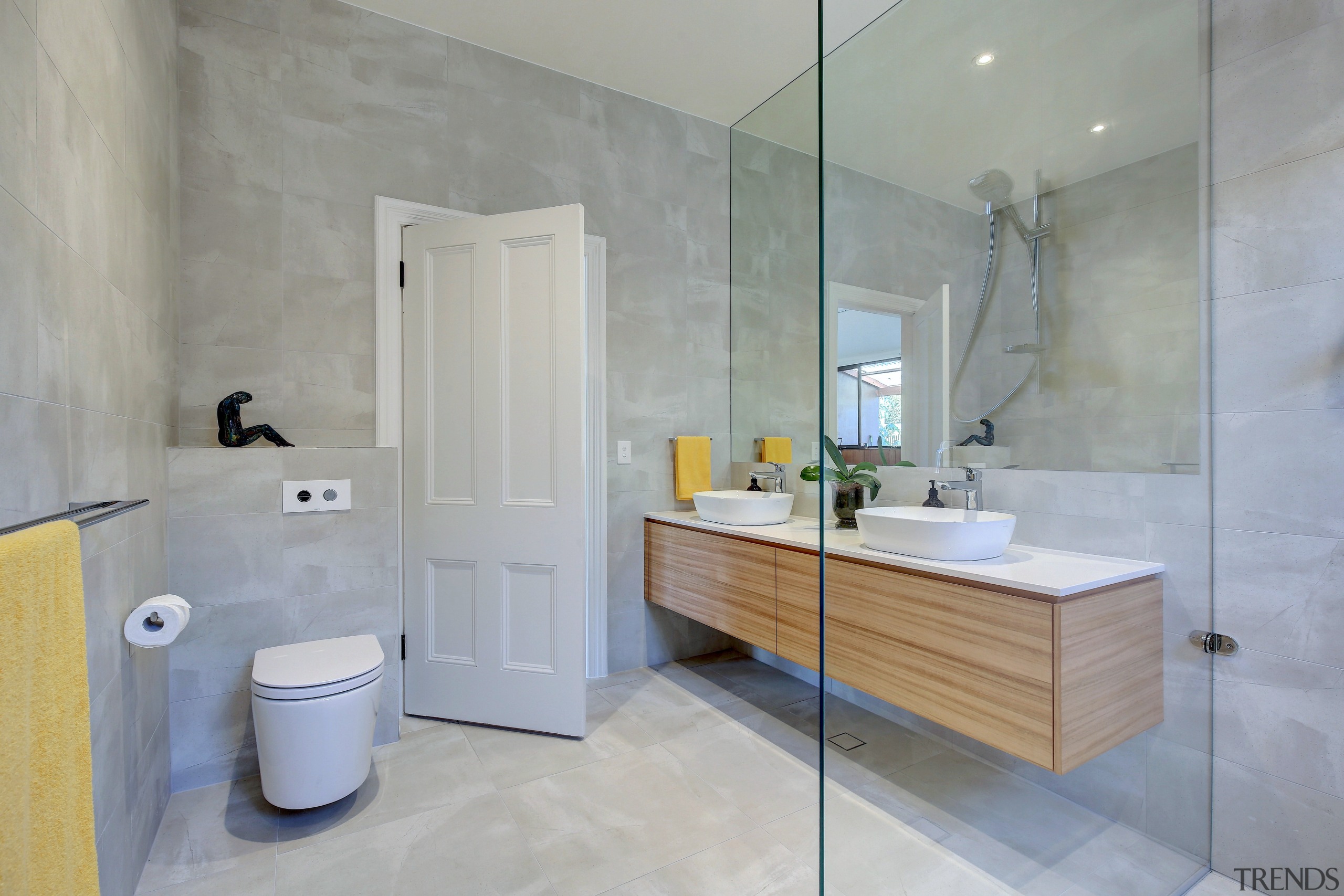 Opting for a glass shower stall extended the architecture, bathroom, building, ceramic, floor, flooring, furniture, home, house, interior design, material property, plumbing fixture, property, real estate, room, tap, tile, wall, gray