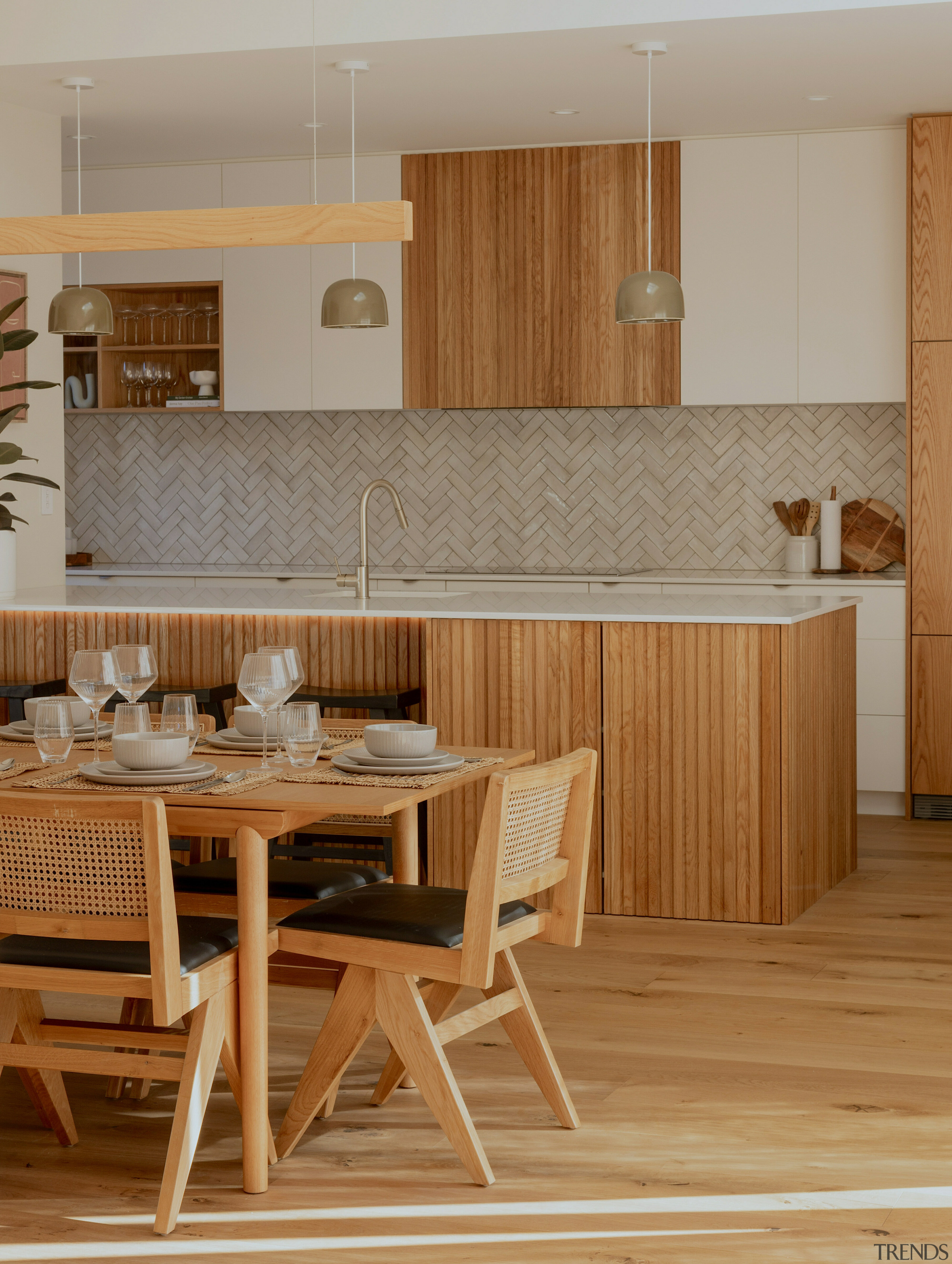 Natural materials, layered textures, and curated styling elements 