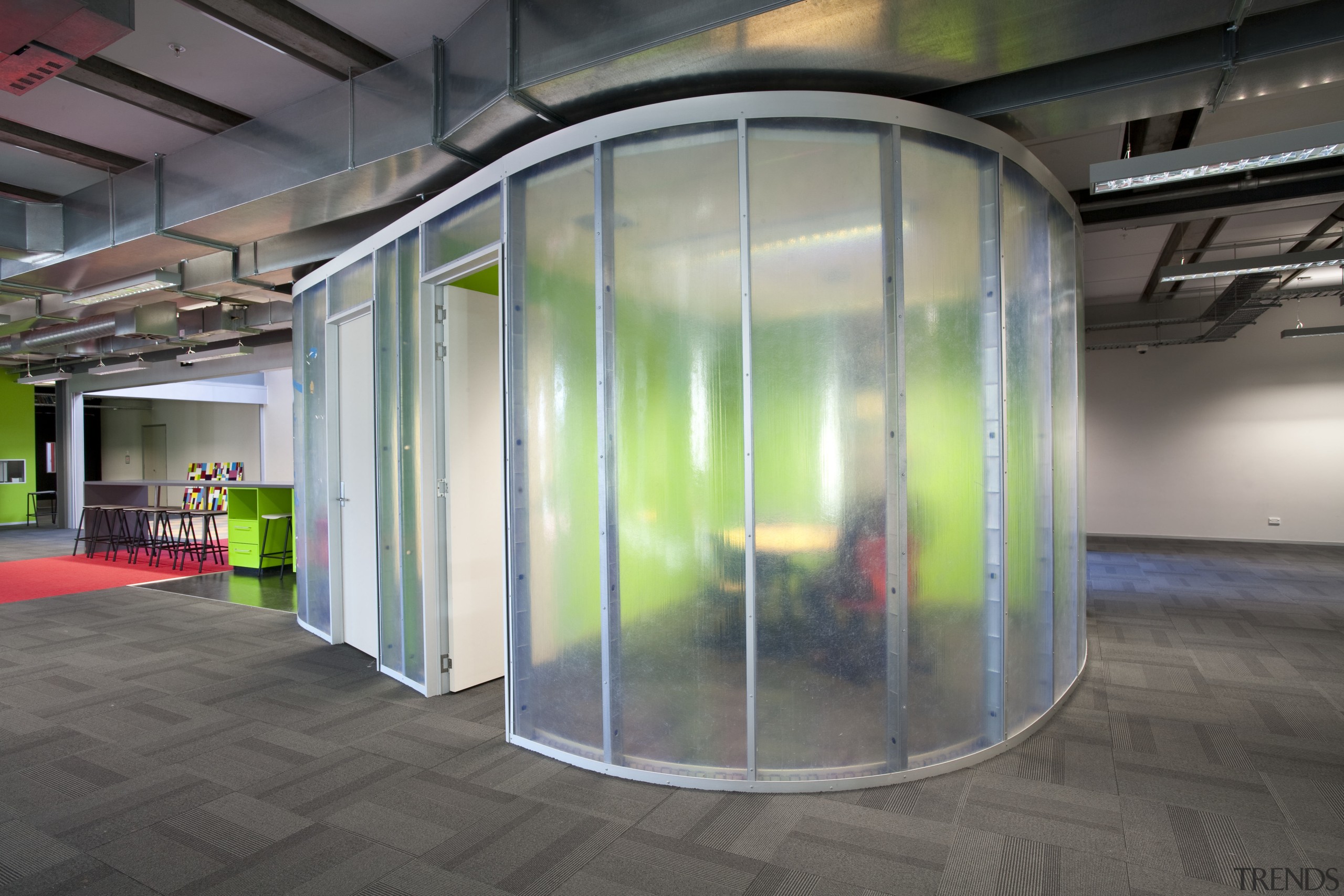 Interior view of this contemporary office features plastic architecture, glass, gray