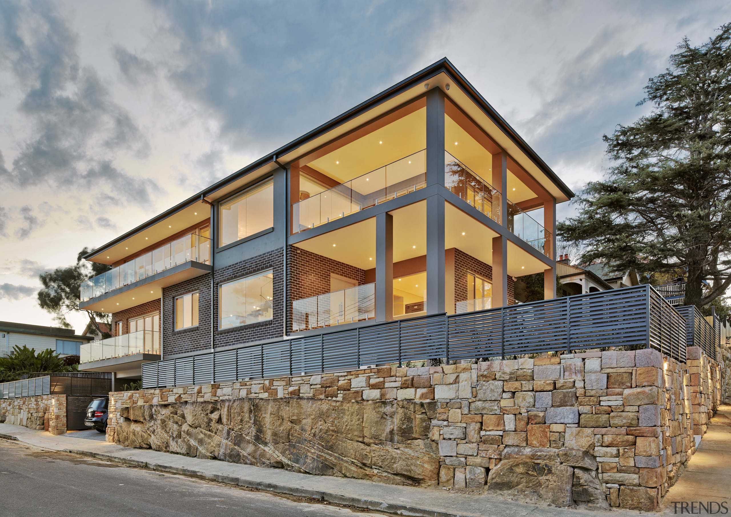 Contemporary 3 level house by Starr Constructions appears architecture, building, commercial building, cottage, facade, home, house, property, real estate, residential area, siding, gray