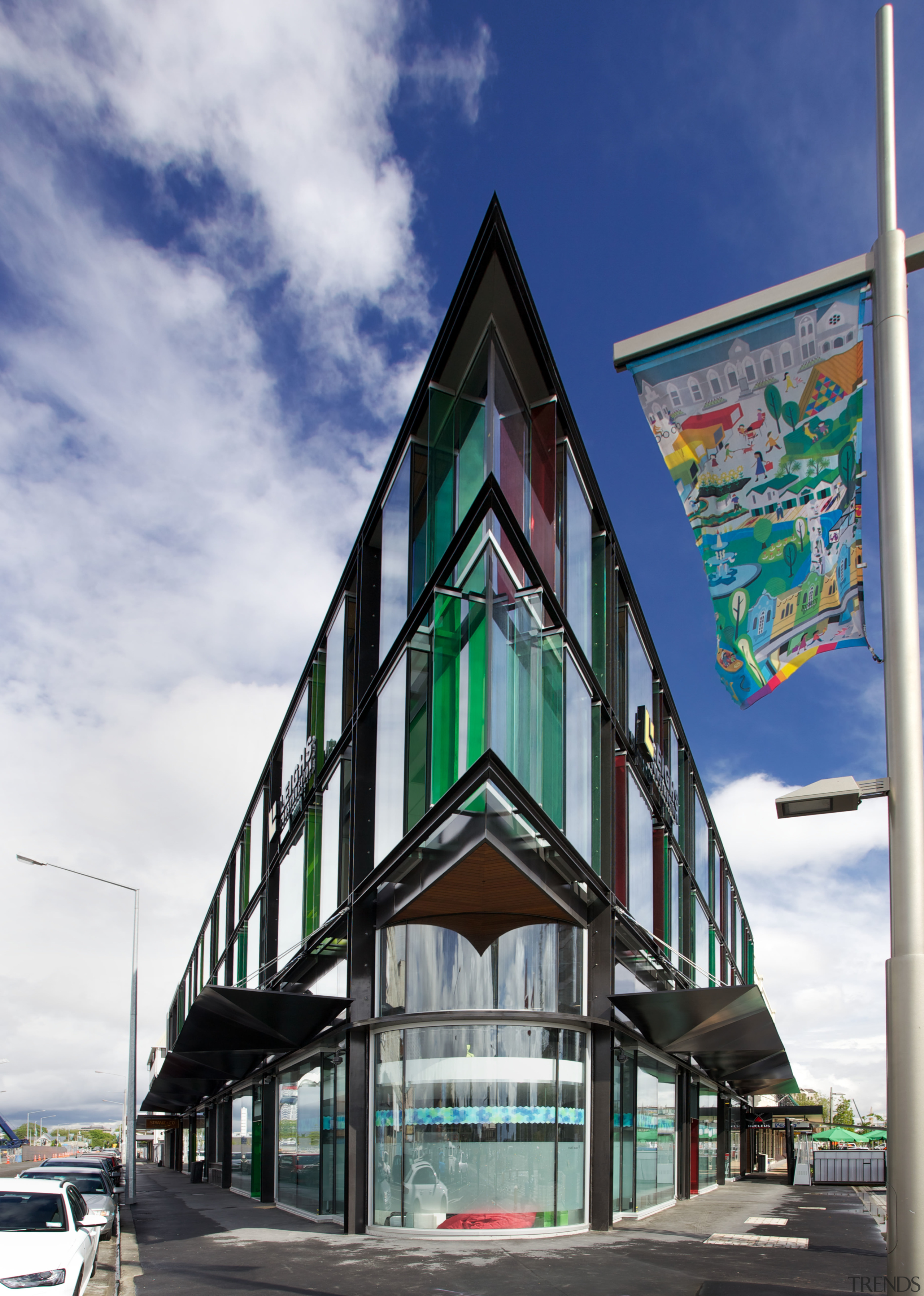 Positioned at the junction of two main streets, architecture, building, facade, house, mixed use, sky, window, gray
