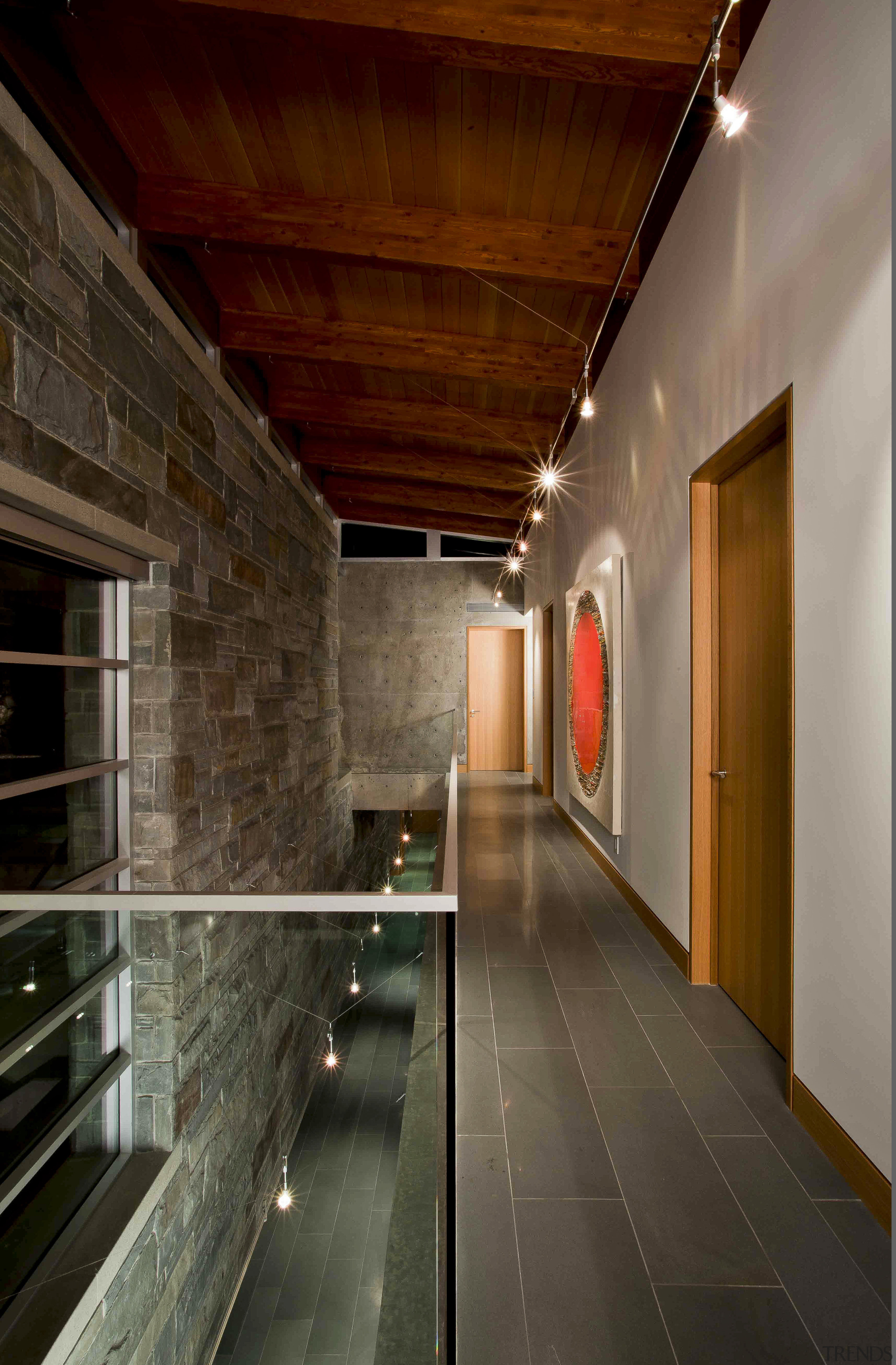 View of hallway with stone wall feature. - architecture, ceiling, interior design, lobby, wood, brown