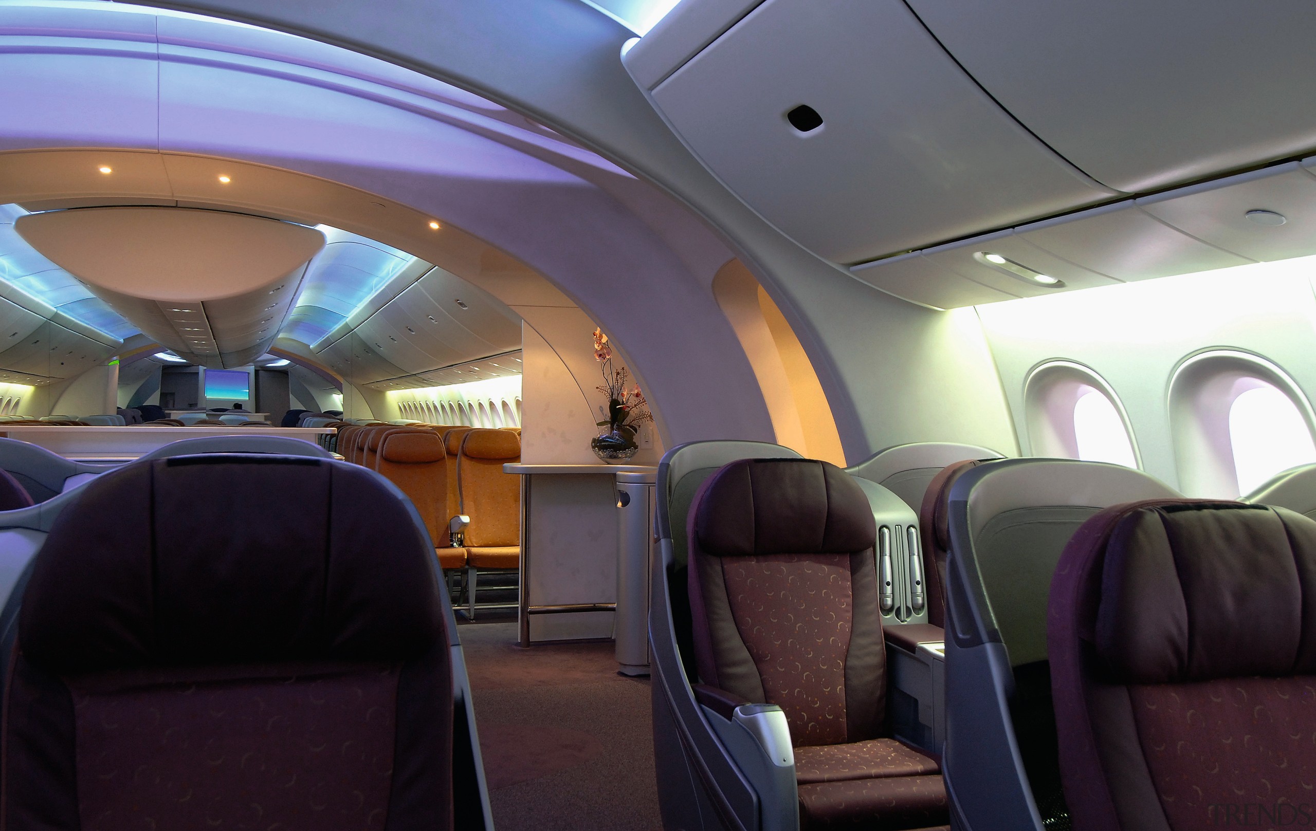 A view of the cabin area. - A air travel, aircraft, aircraft cabin, airline, airplane, aviation, interior design, passenger, black, gray