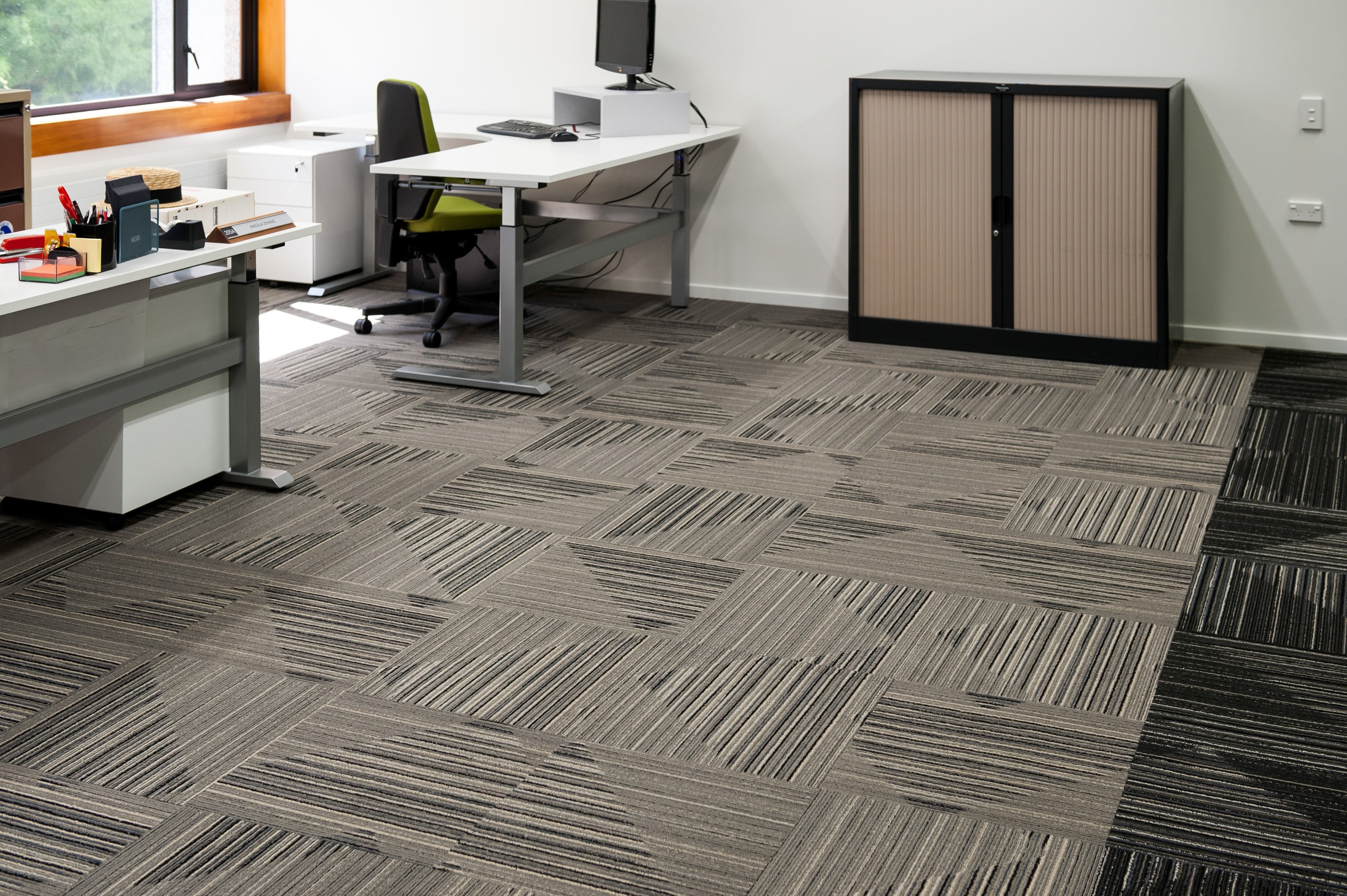 Durable, good-looking carpet tiles for commercial use.  floor, flooring, hardwood, laminate flooring, tile, wood, wood flooring, gray