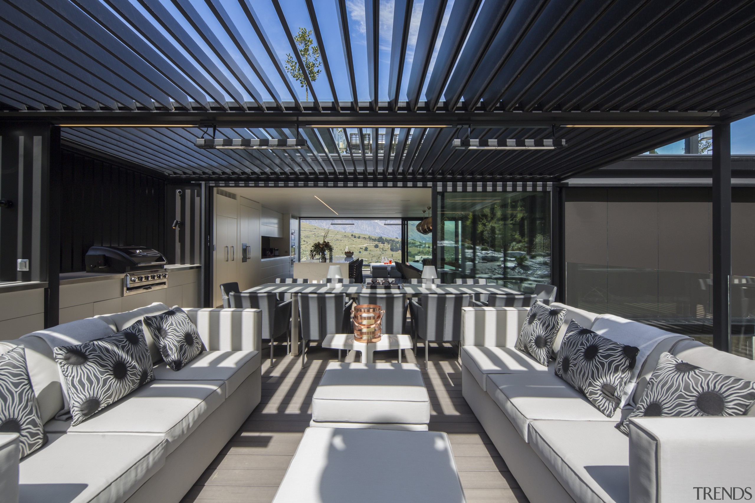 ​​​​​​​An outdoor barbecue and pizza area continues on architecture, interior design, Gary Todd Architecture, outdoor area, louvred roof