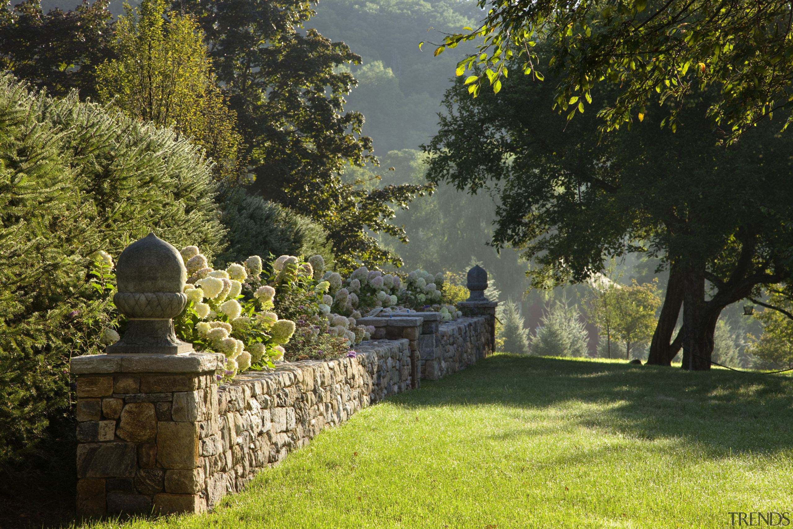 View of grand house with 18th and 19th autumn, estate, garden, grass, landscape, landscaping, lawn, leaf, nature, plant, shrub, sunlight, tree, wall, brown