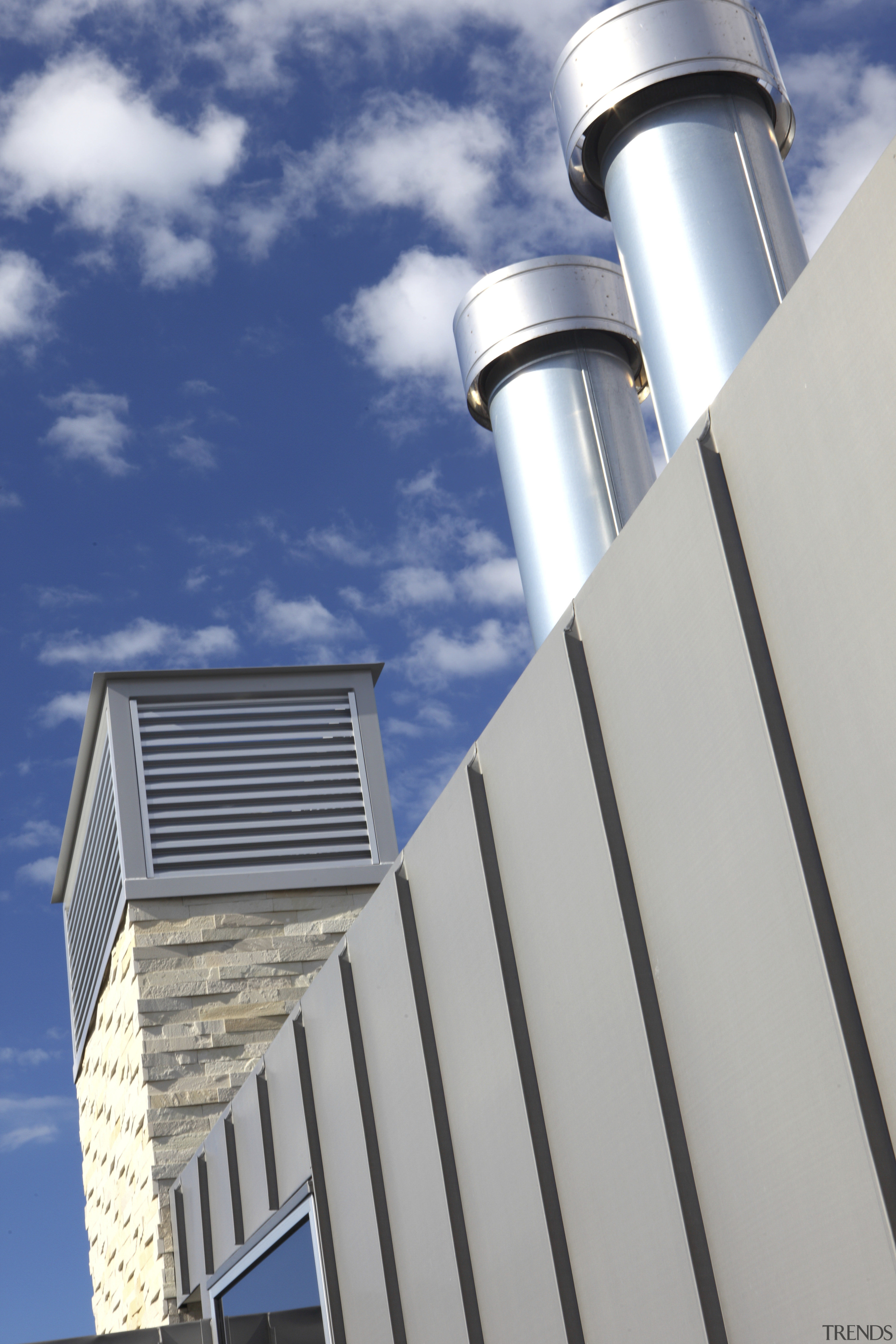 Zinc cladding featuring an angled seam, manufactured and architecture, building, cloud, daylighting, daytime, energy, facade, roof, sky, gray, blue