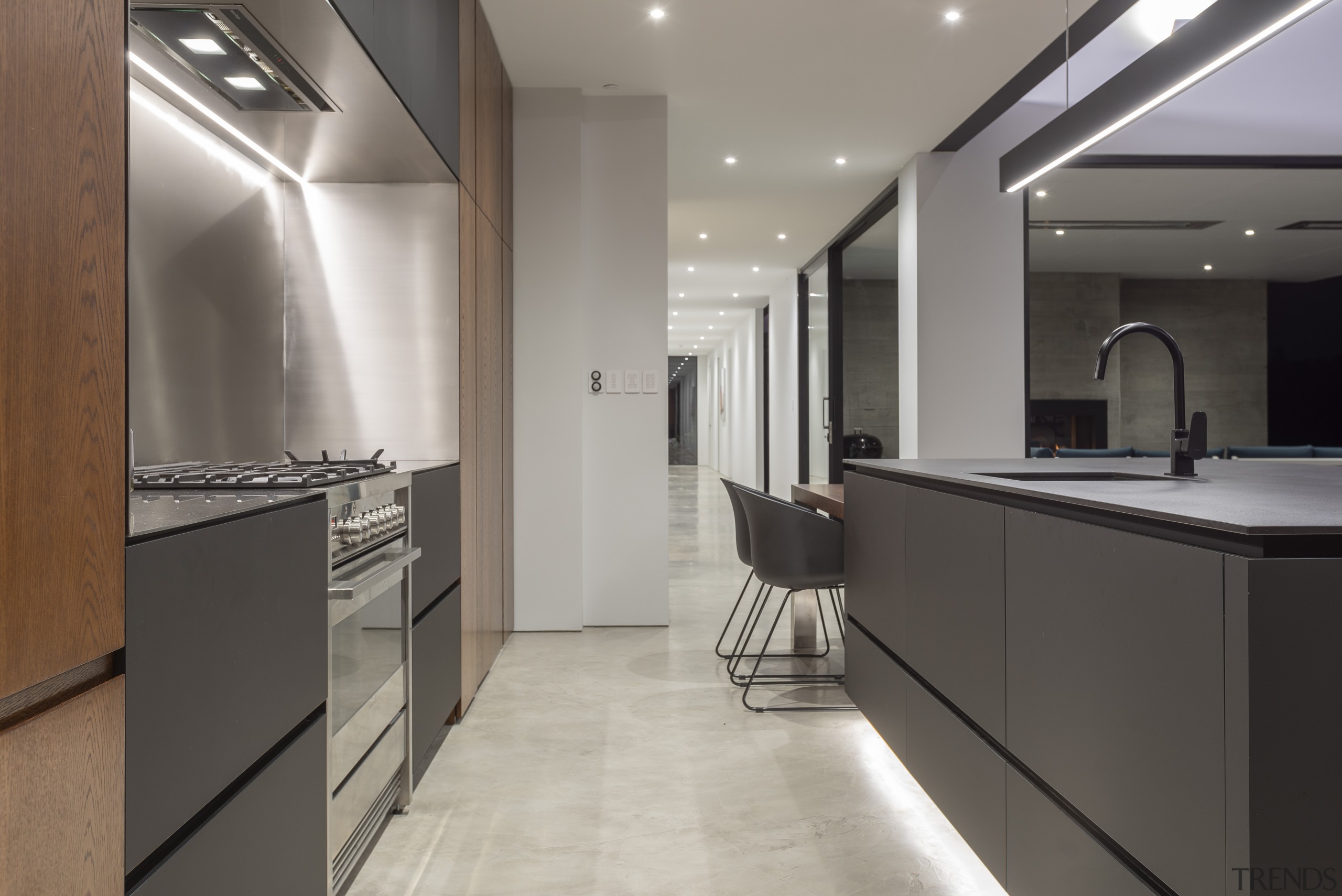 ​​​​​​​Slimline Dekton benchtops with a negative detail, together architecture, lighting, kitchen, pendant, cabinetry, countertop, floor, flooring, furniture, interior design, kitchen, Dekton, Cube Dentro, 