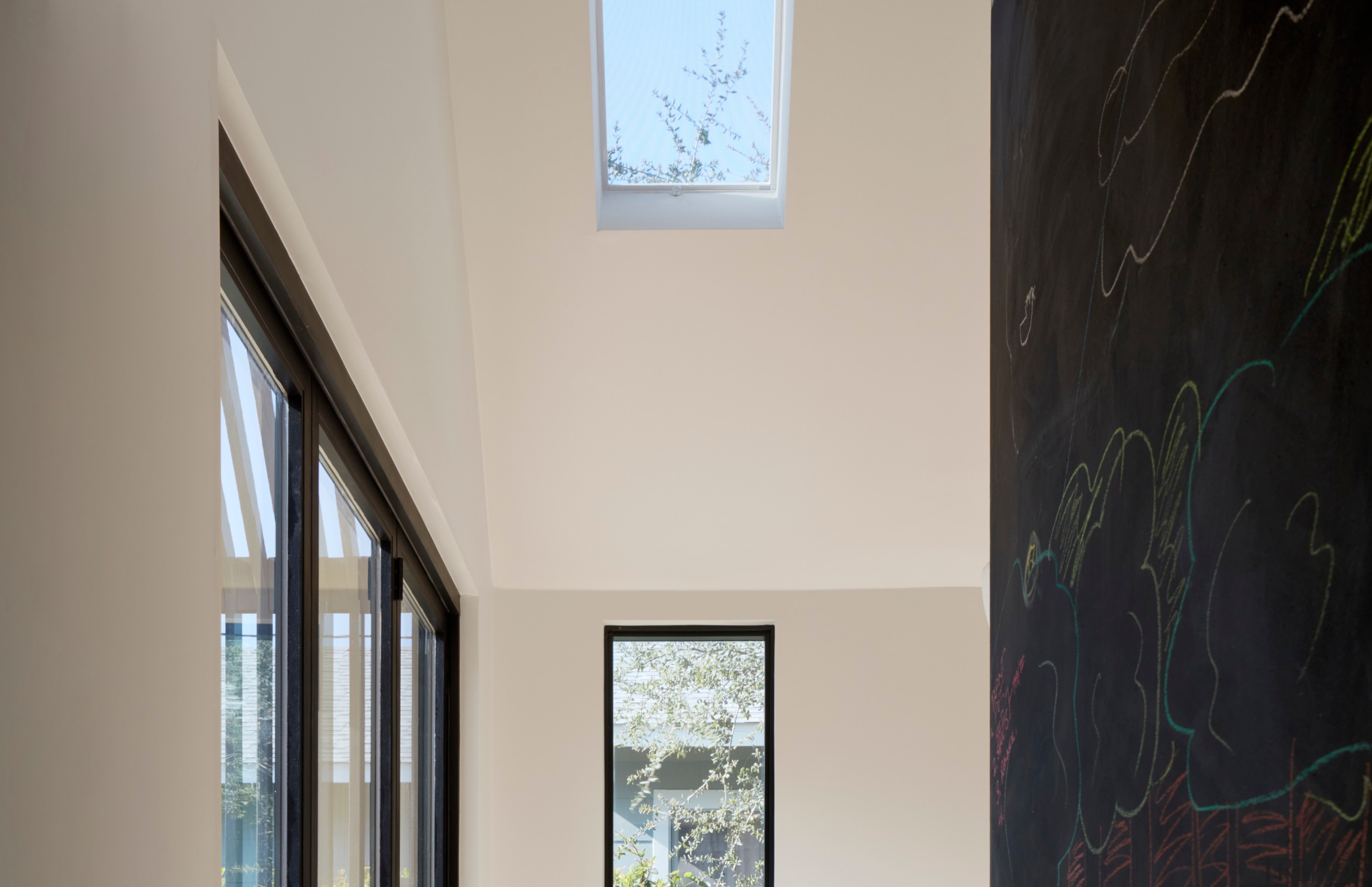 This hallway, covered in chalk paint for doodling 