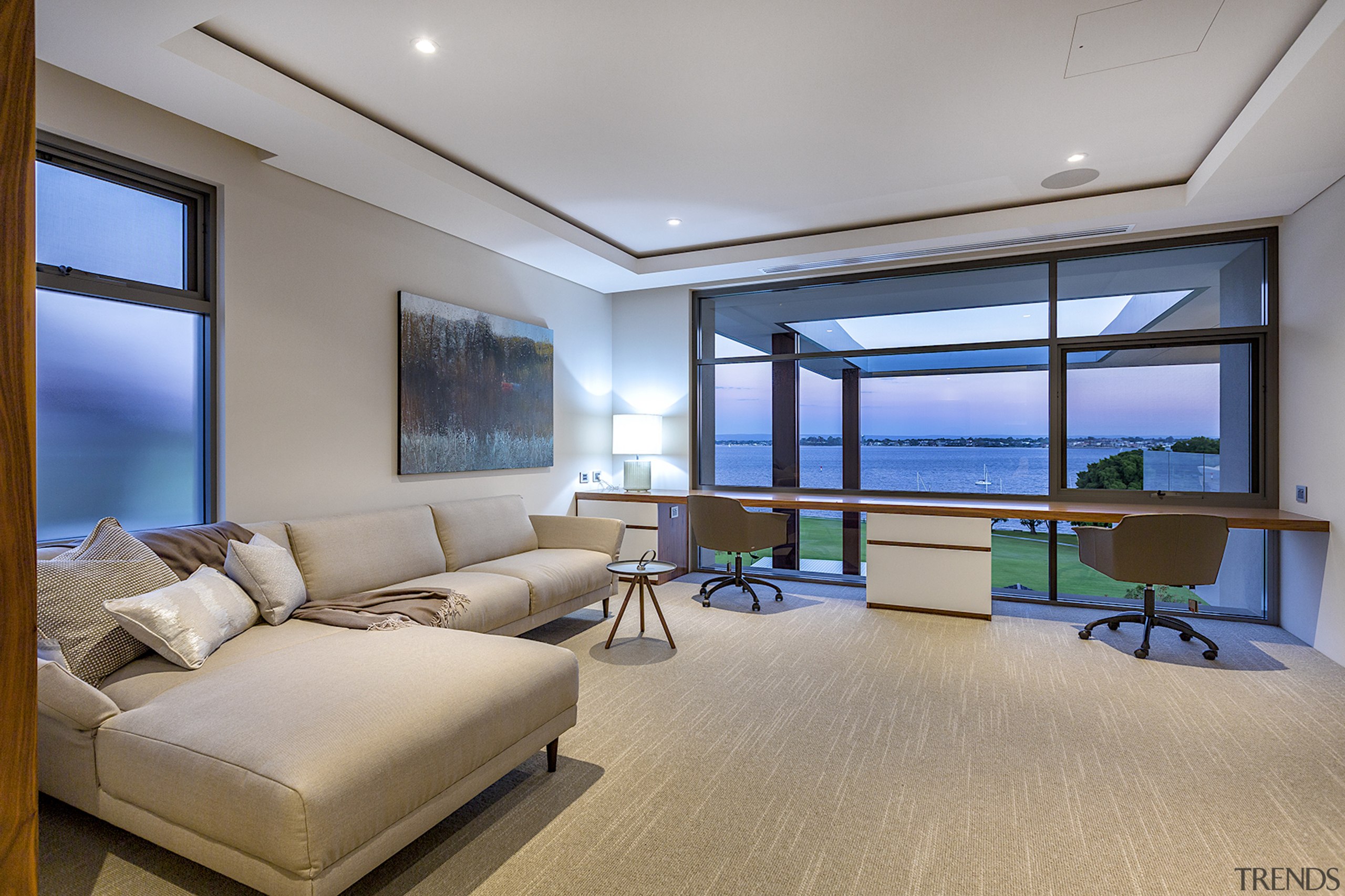 This living space/study in an upmarket Perth home apartment, architecture, building, ceiling, floor, furniture, home, house, interior design, lighting, living room, loft, property, real estate, room, table, wall, window, gray