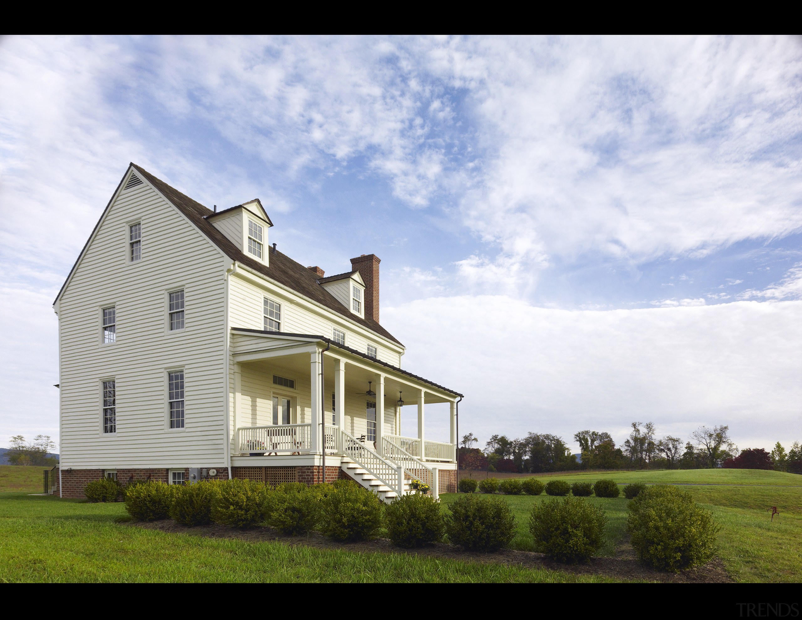 This home was built by Tom Glass of cloud, cottage, estate, facade, farmhouse, grass, home, house, property, real estate, residential area, rural area, siding, sky, white