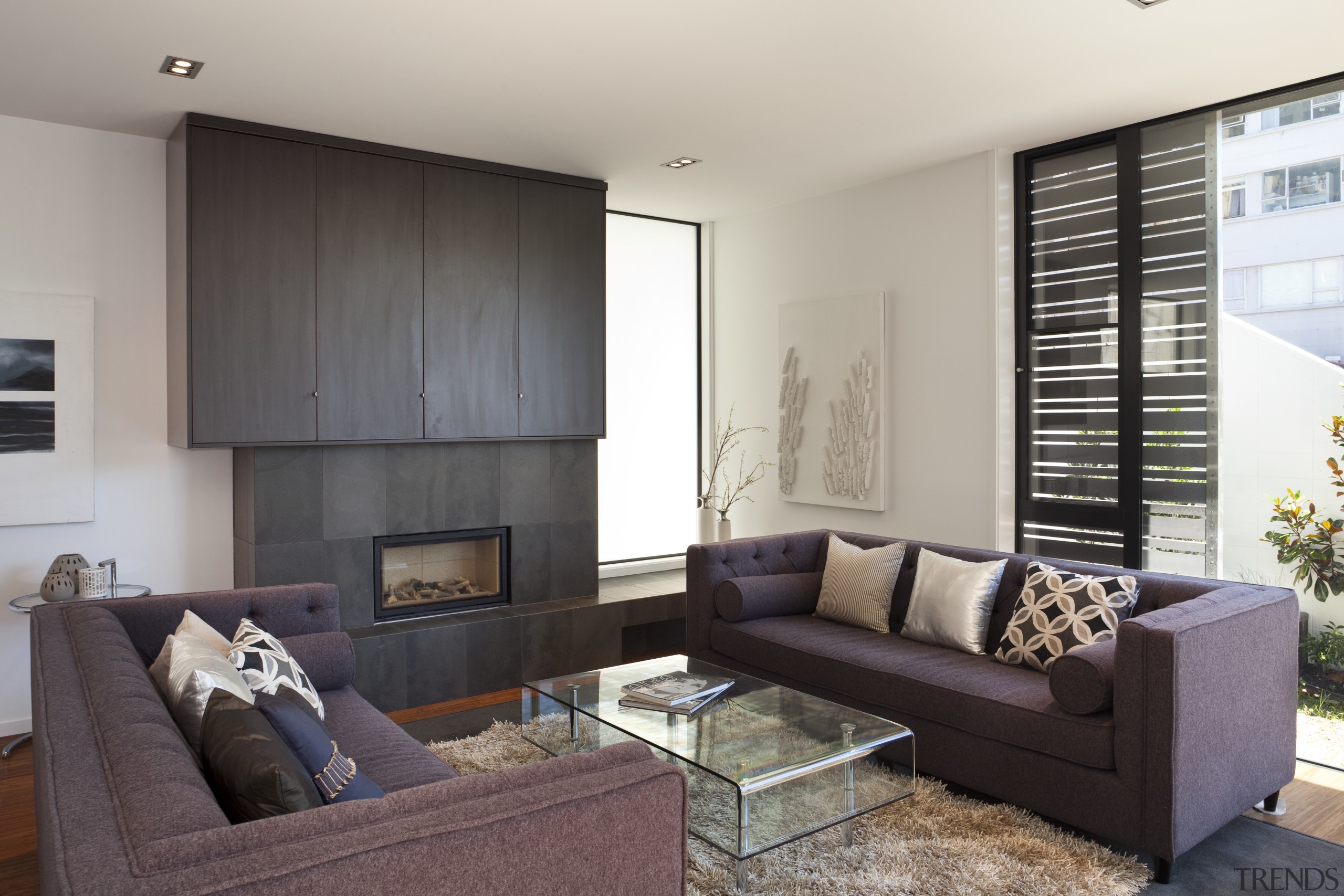 Lounge area with fluffy matt, glass table and home, house, interior design, living room, property, real estate, room, window, window covering, gray