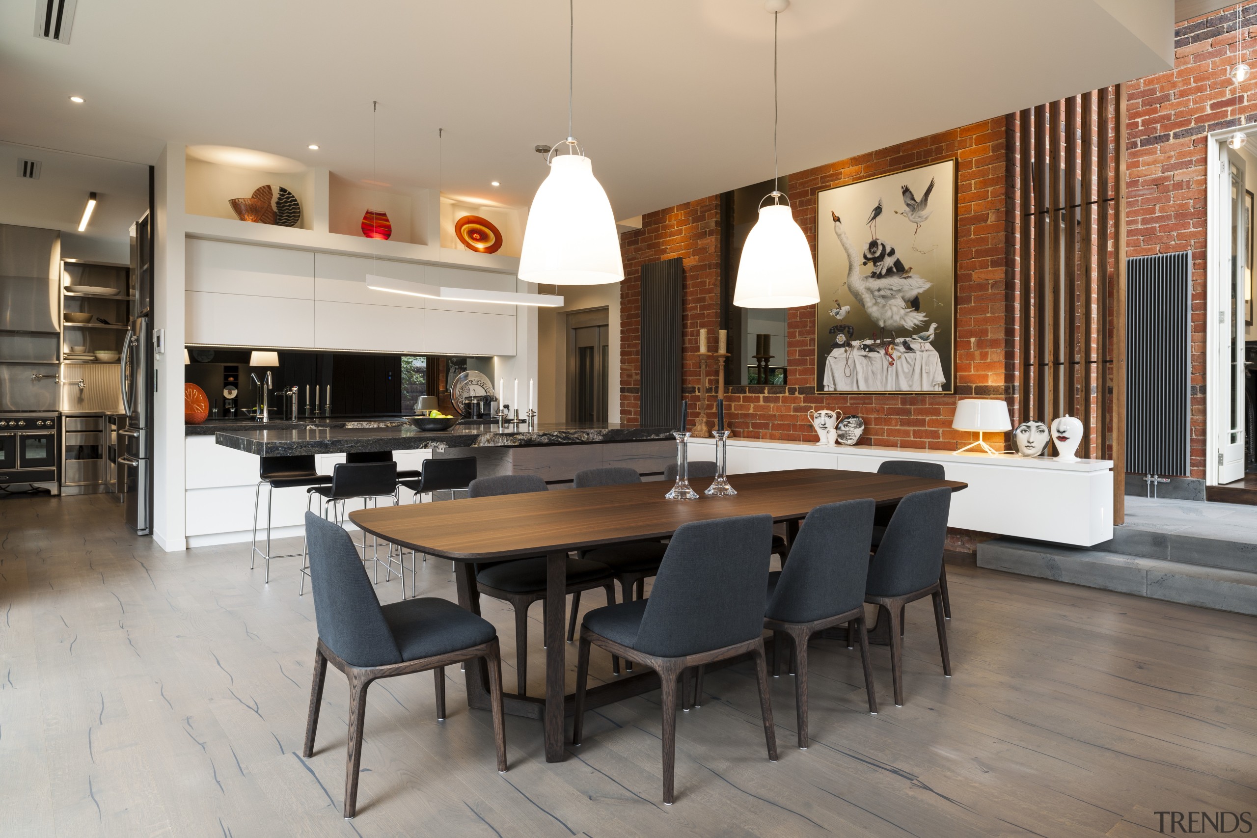 Strong contemporary lines characterise the new addition in dining room, flooring, interior design, kitchen, table, gray