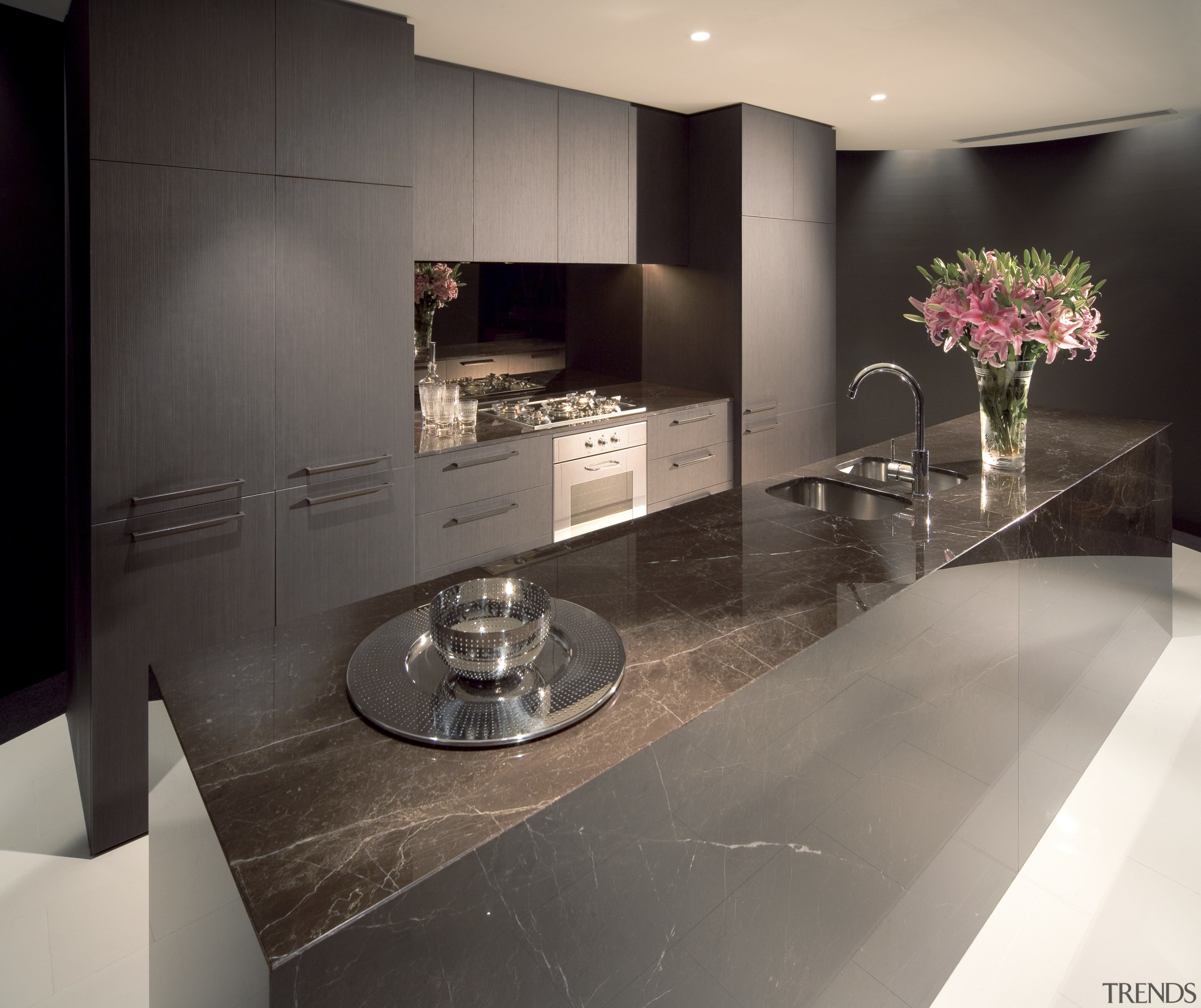 Kitchens are deigned with marble benchtops and cainetry countertop, floor, flooring, interior design, kitchen, gray, black