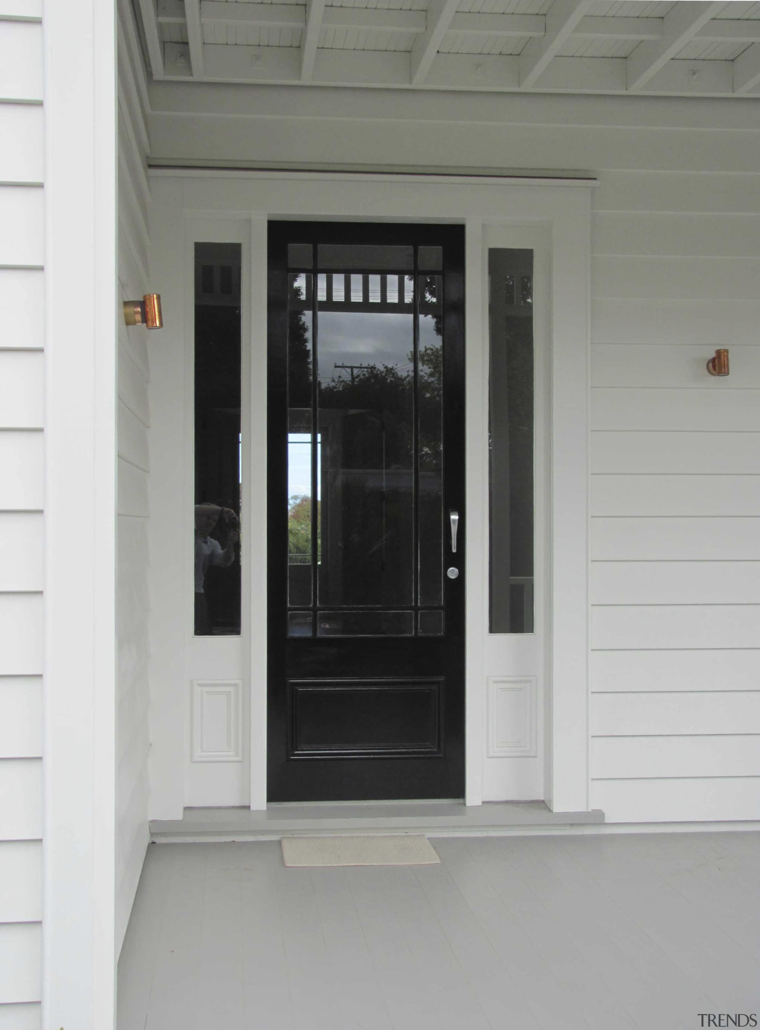 View of a renovated two-storey villa which features door, home, window, gray, white