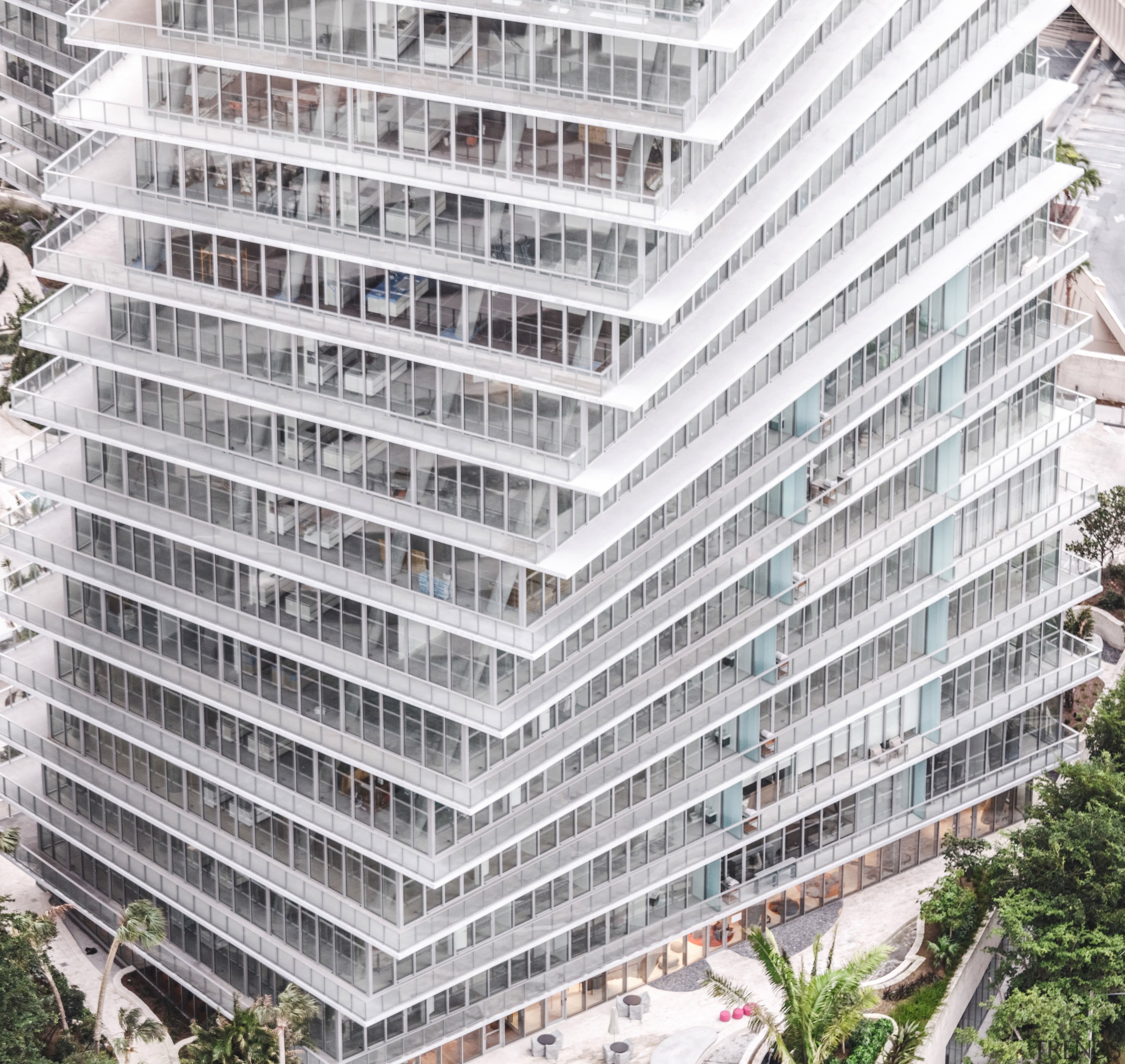At Grove at Grand Bay, the buildings generous apartment, building, condominium, corporate headquarters, facade, metropolitan area, mixed use, property, real estate, residential area, tower block, white, gray