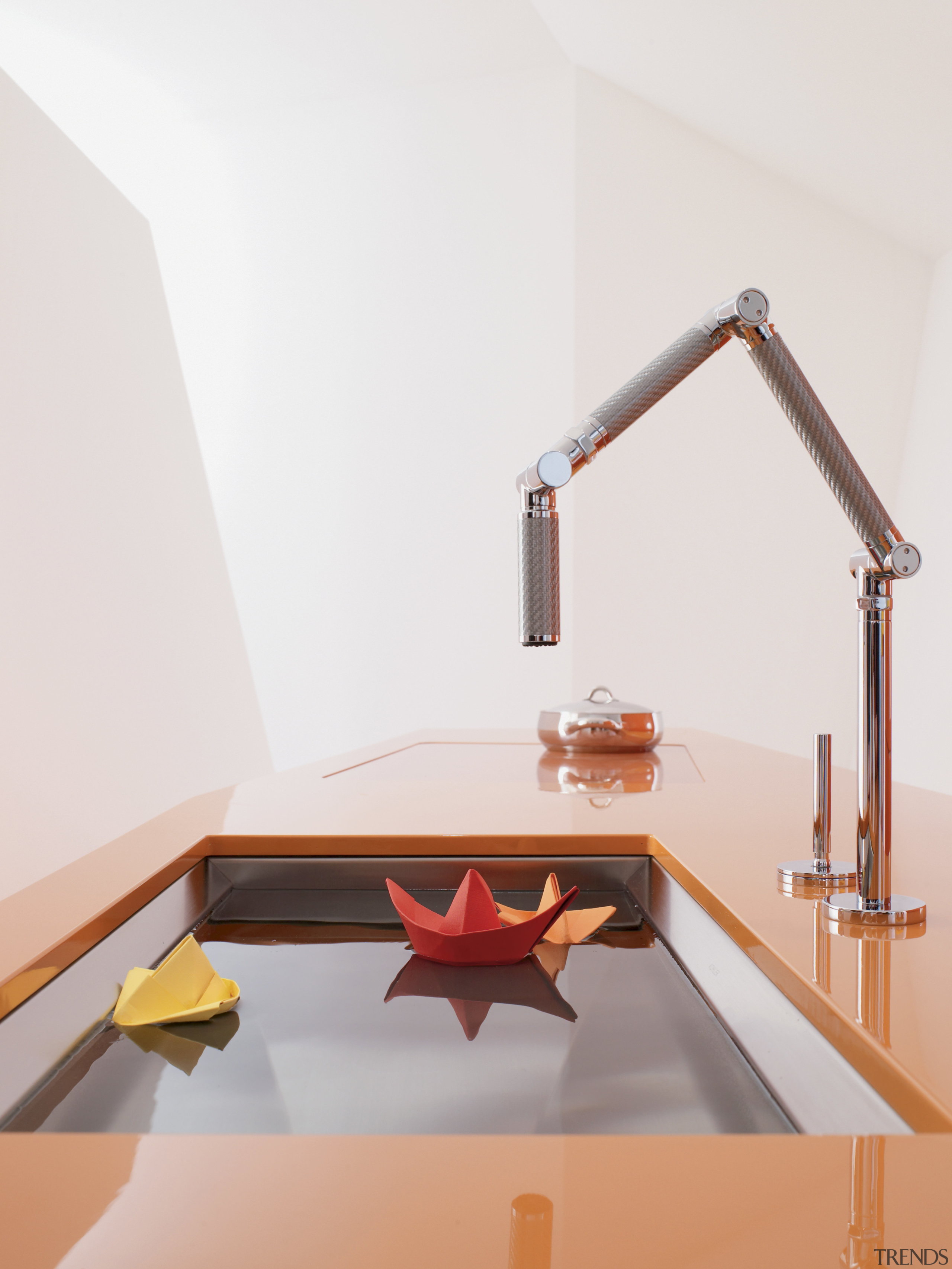 Image of Kohler's new 8 Degree stainless steel angle, furniture, interior design, orange, plumbing fixture, product design, sink, table, tap, white