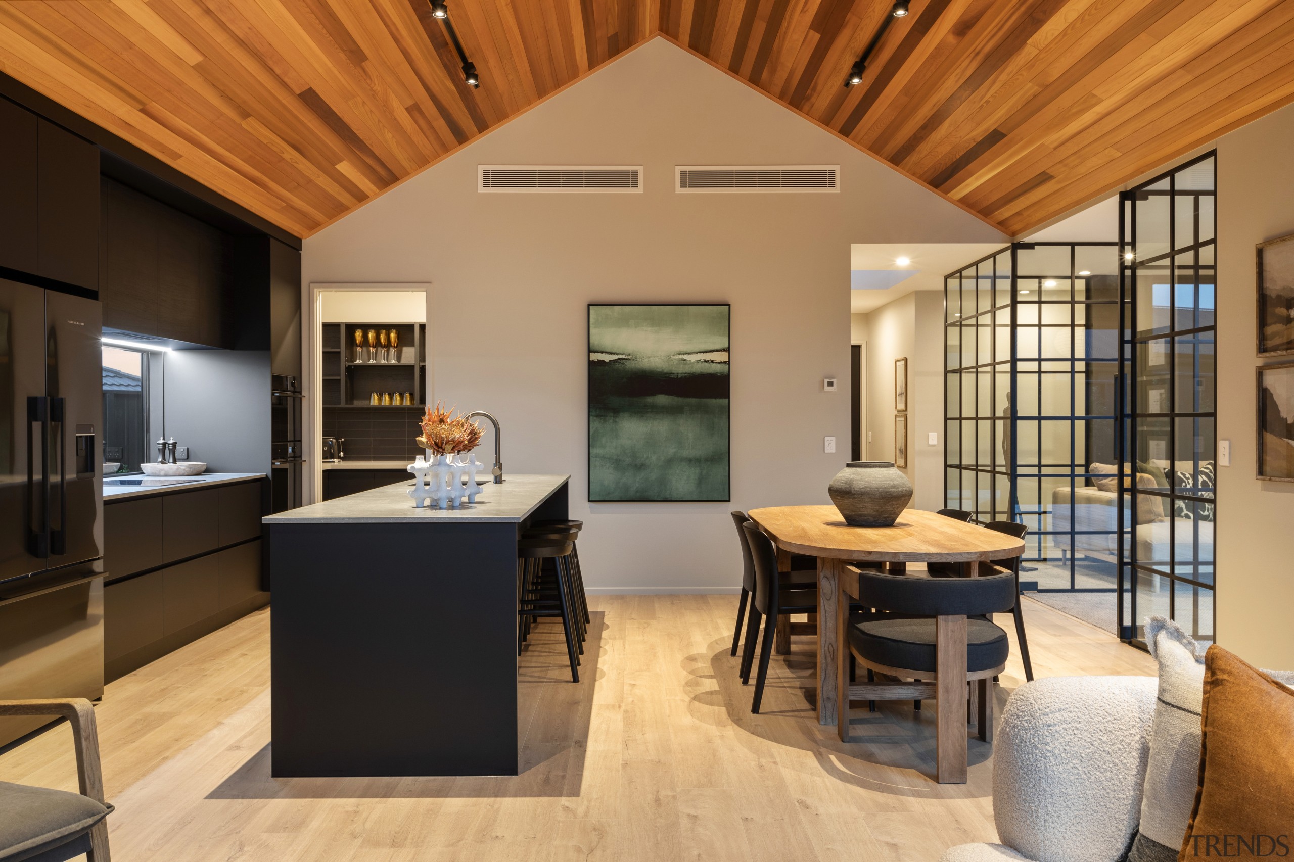 Kitchen, dining and feature internal glass wall. 
