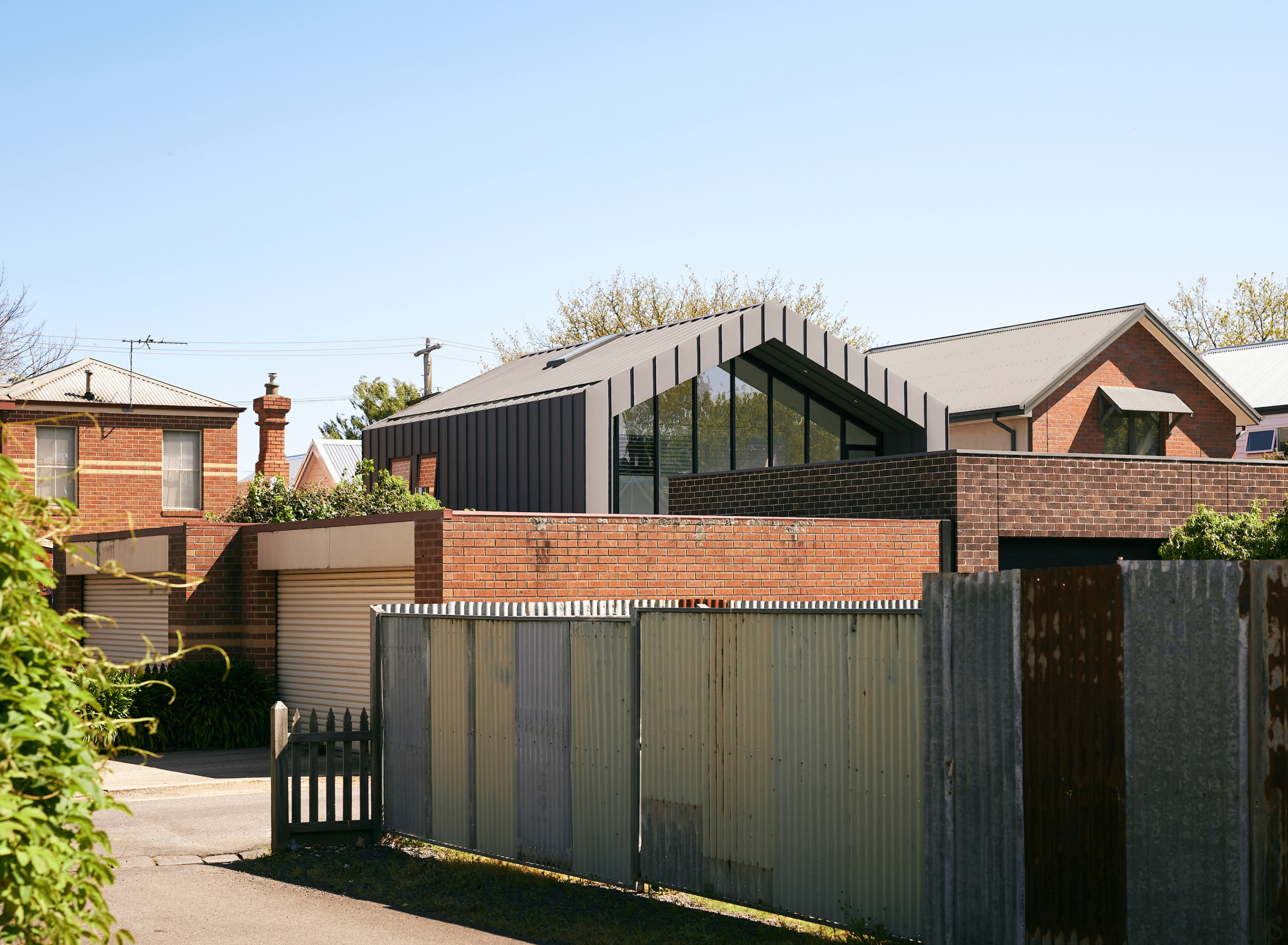 The existing rear entry to the renovated home. 