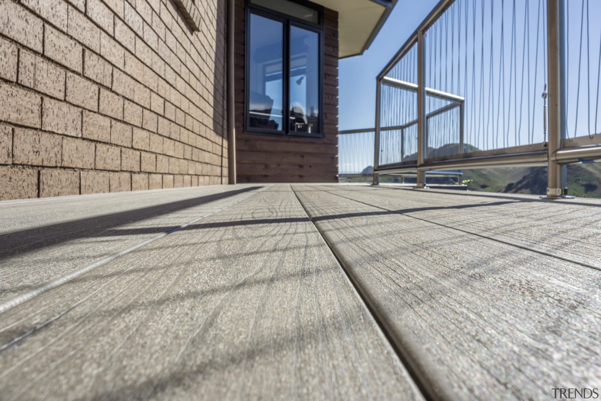 The True Tough Deck  Terrain By TimberTech architecture, building, daylighting, facade, floor, flooring, line, property, real estate, road surface, roof, structure, window, wood, gray