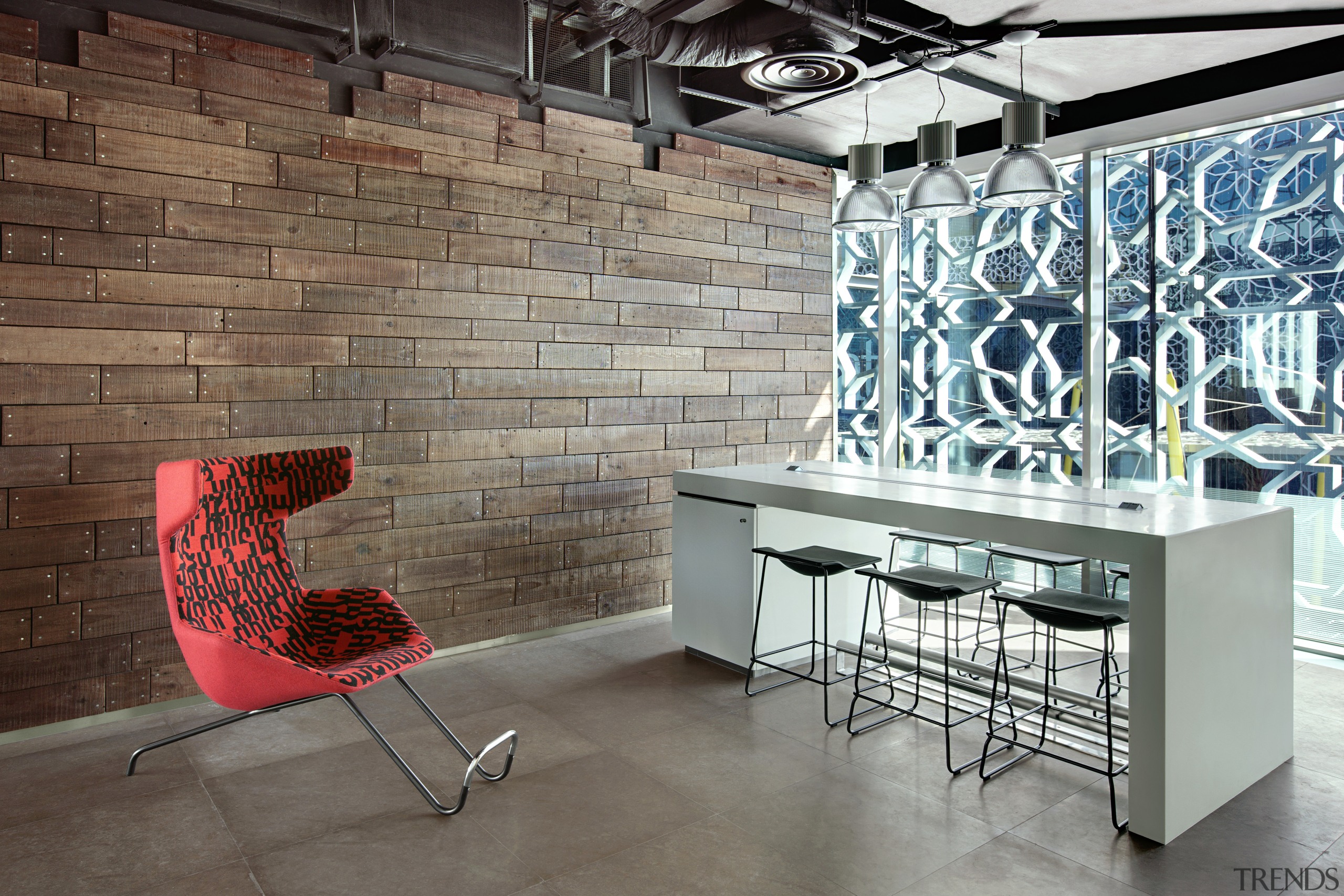 View of seating area with red chair and floor, flooring, furniture, interior design, product design, table, wall, gray