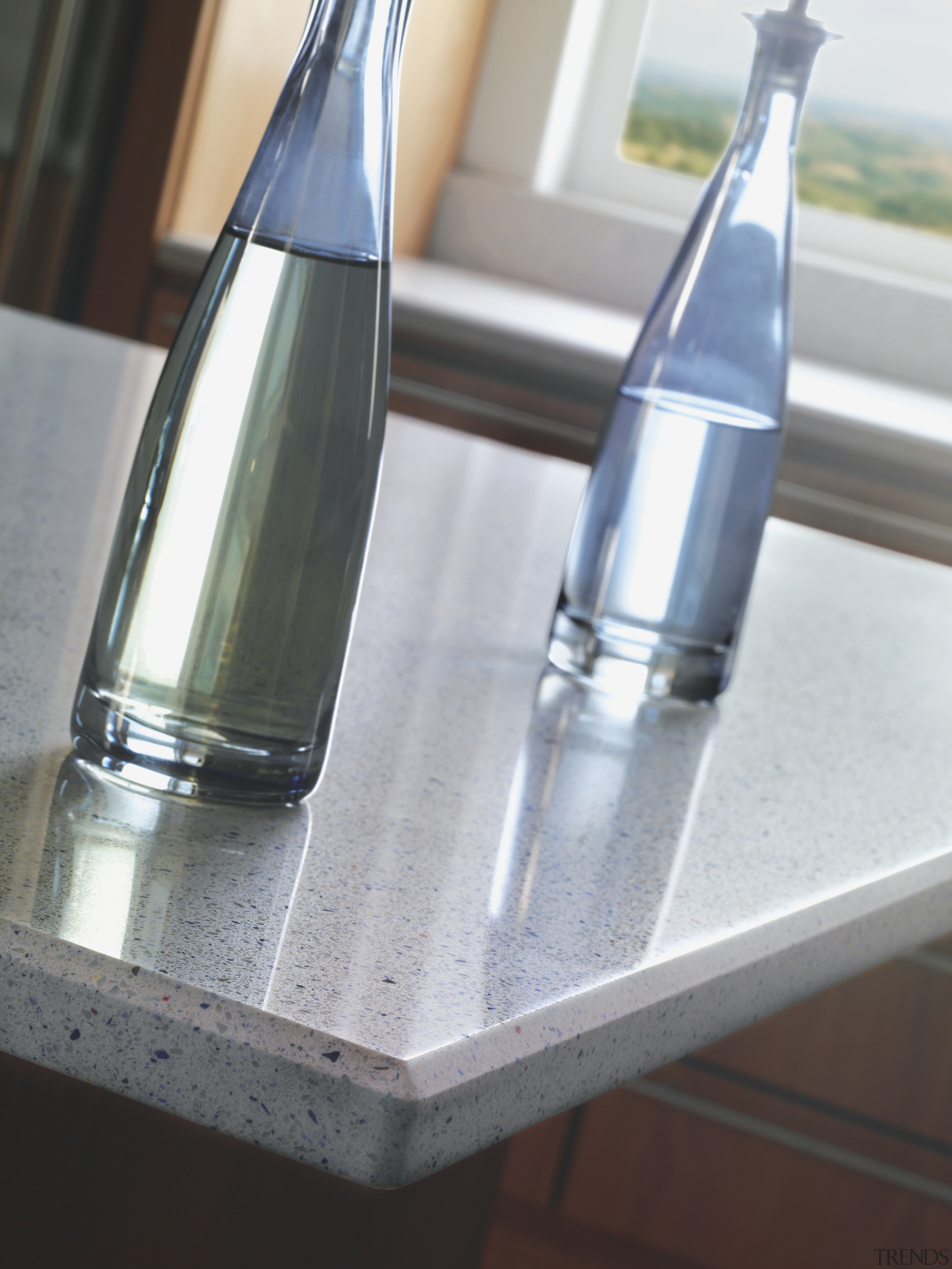 Image of the new Life Series Silestone Quartz bottle, glass, glass bottle, water, gray