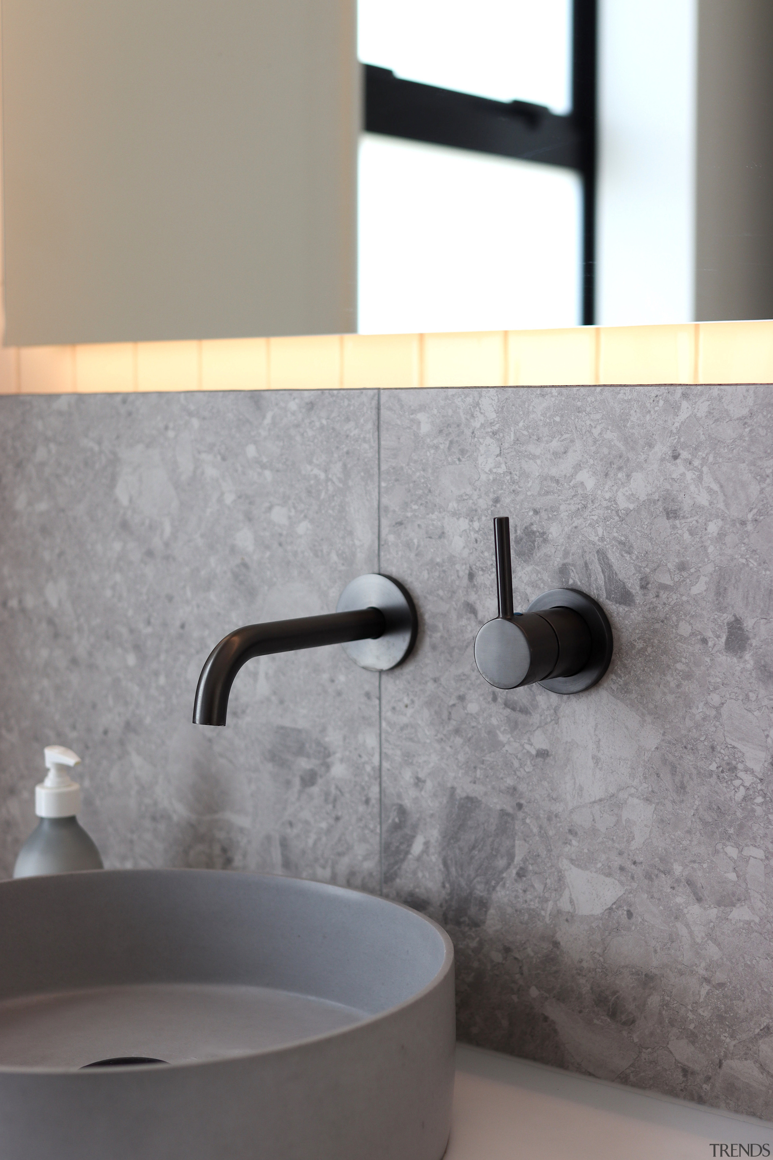 Gunmetal tapware by Robertson adds another tonal layer 