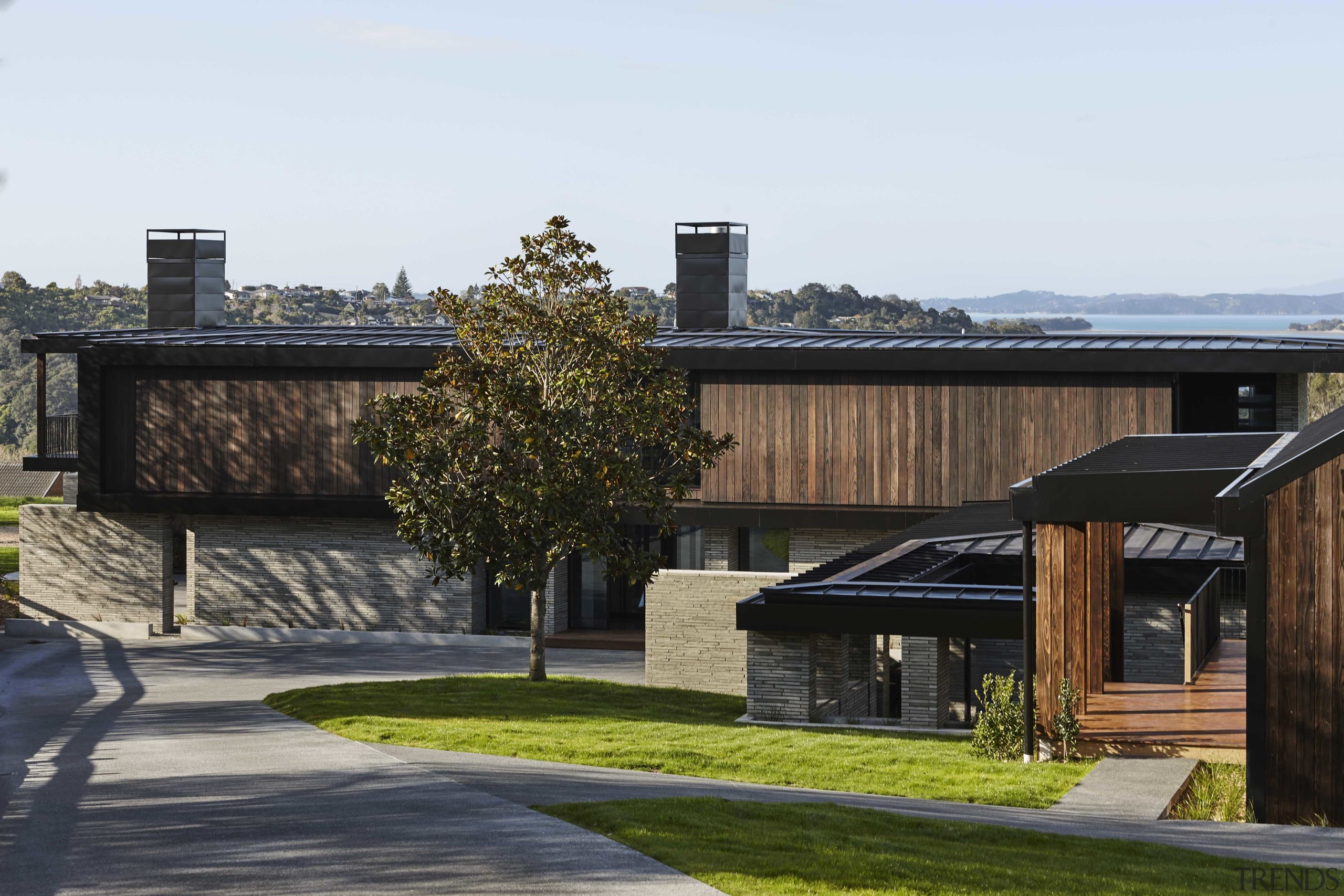 Above the brick ‘base’ walls are rich timber 