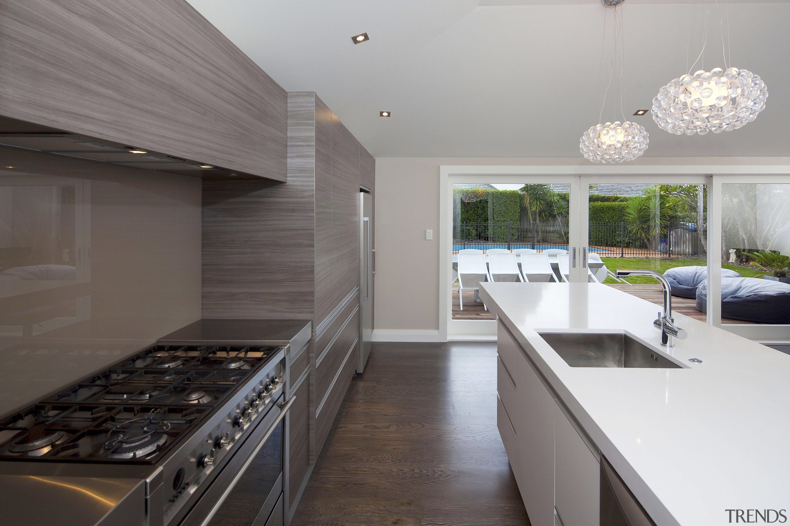 View of a kitchen which features white CeasarStone countertop, house, interior design, kitchen, real estate, room, window, gray