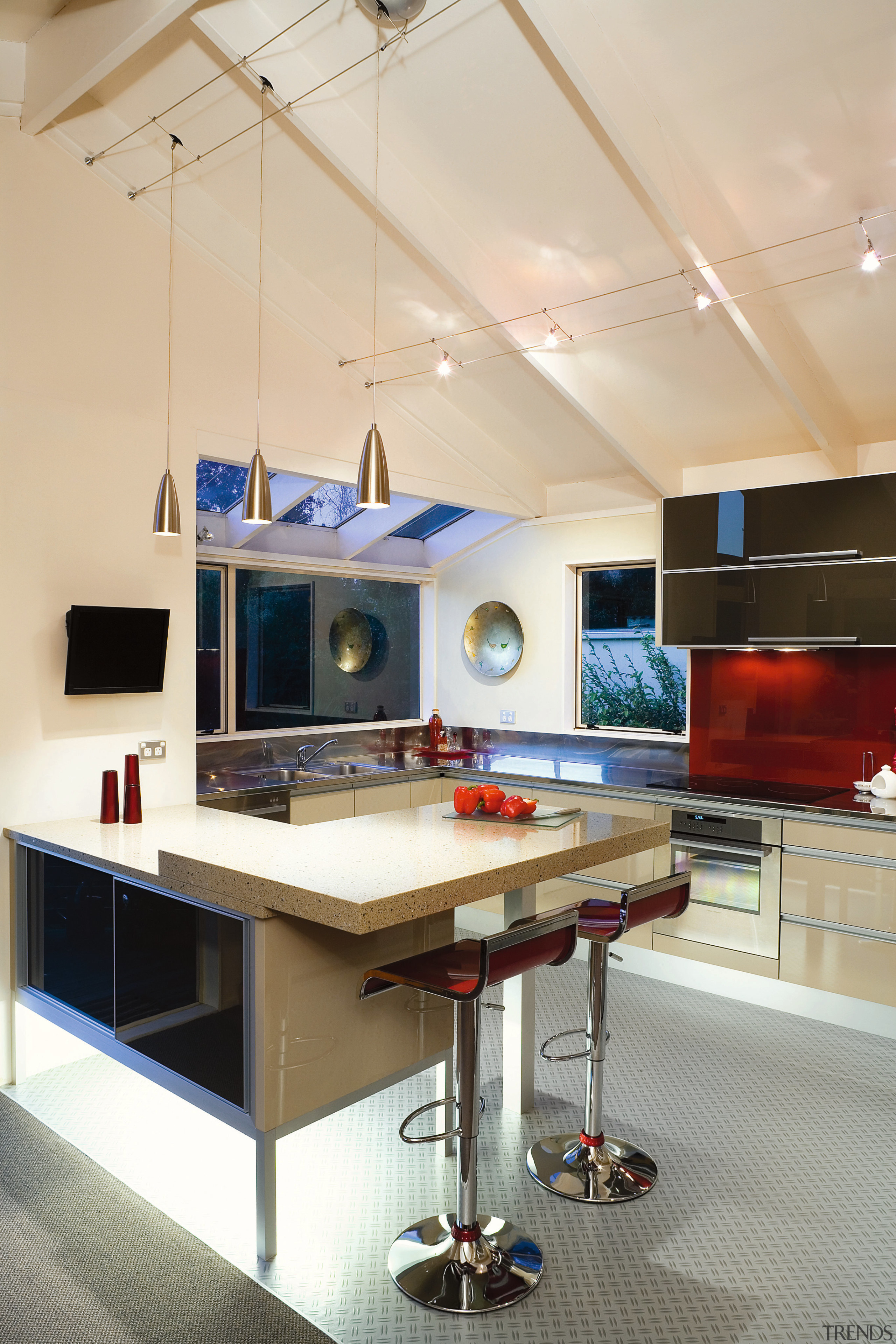 A view of this kitchen featuring quarell and ceiling, countertop, interior design, kitchen, room, orange