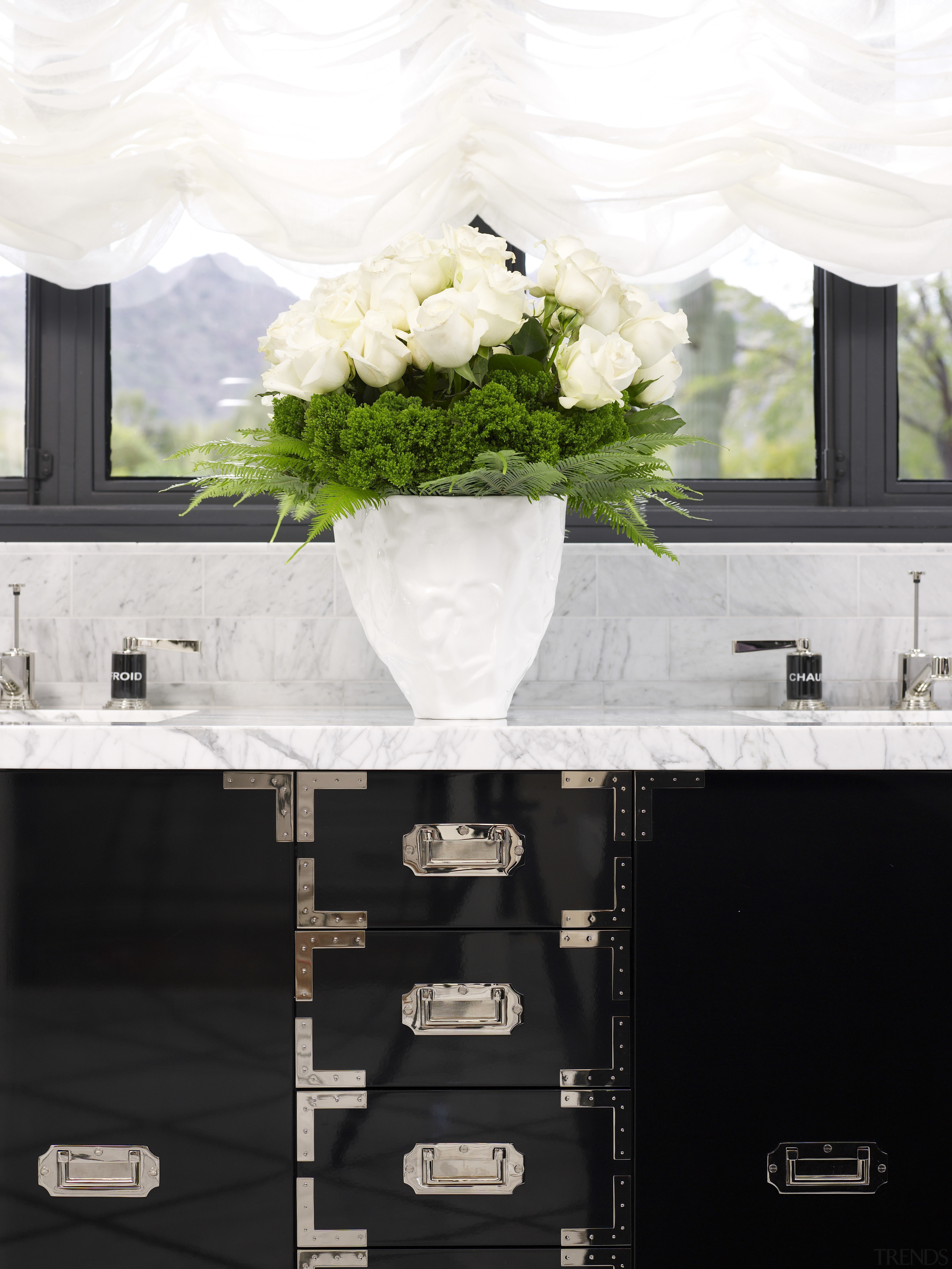 Jamie Herzlinger has designed this master suite to flower, furniture, home, interior design, table, white, white, black