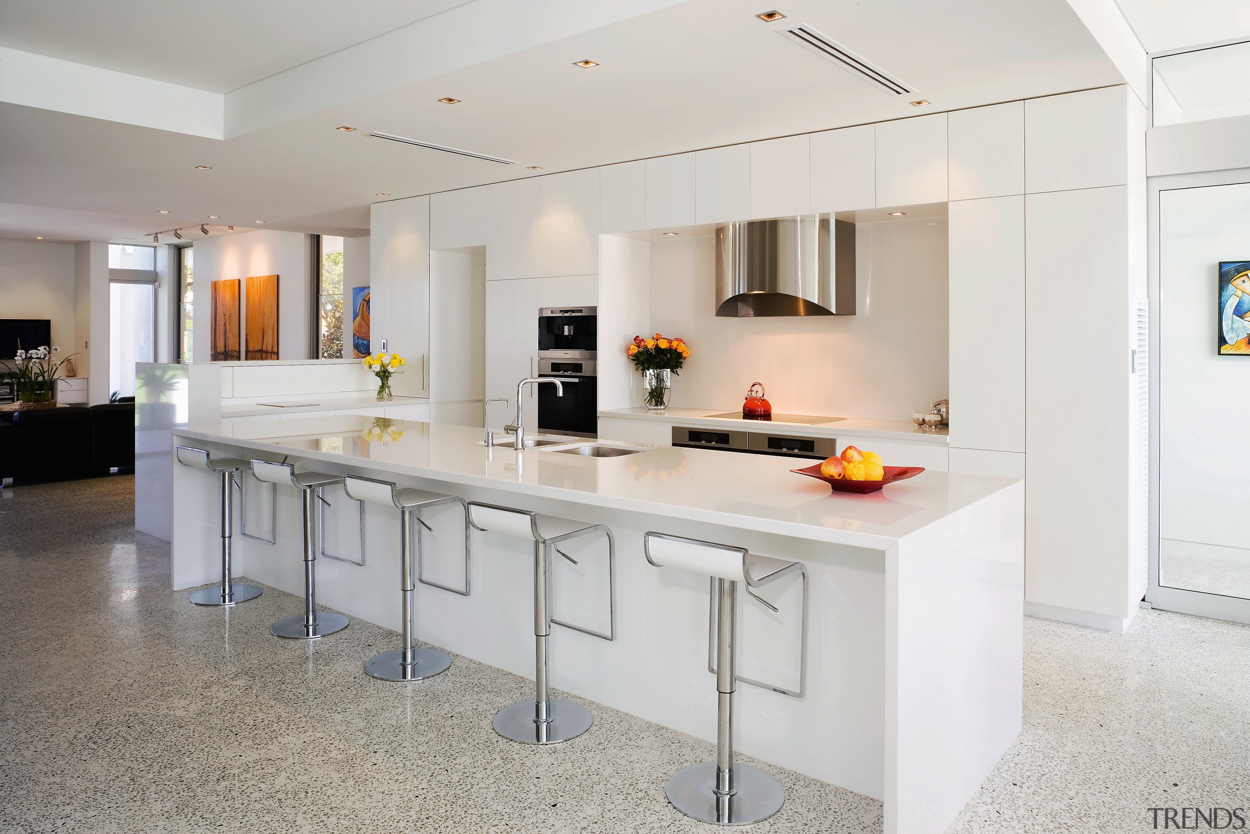 View of this kitchen featuring polished concrete flooring, countertop, cuisine classique, interior design, kitchen, real estate, room, gray, white